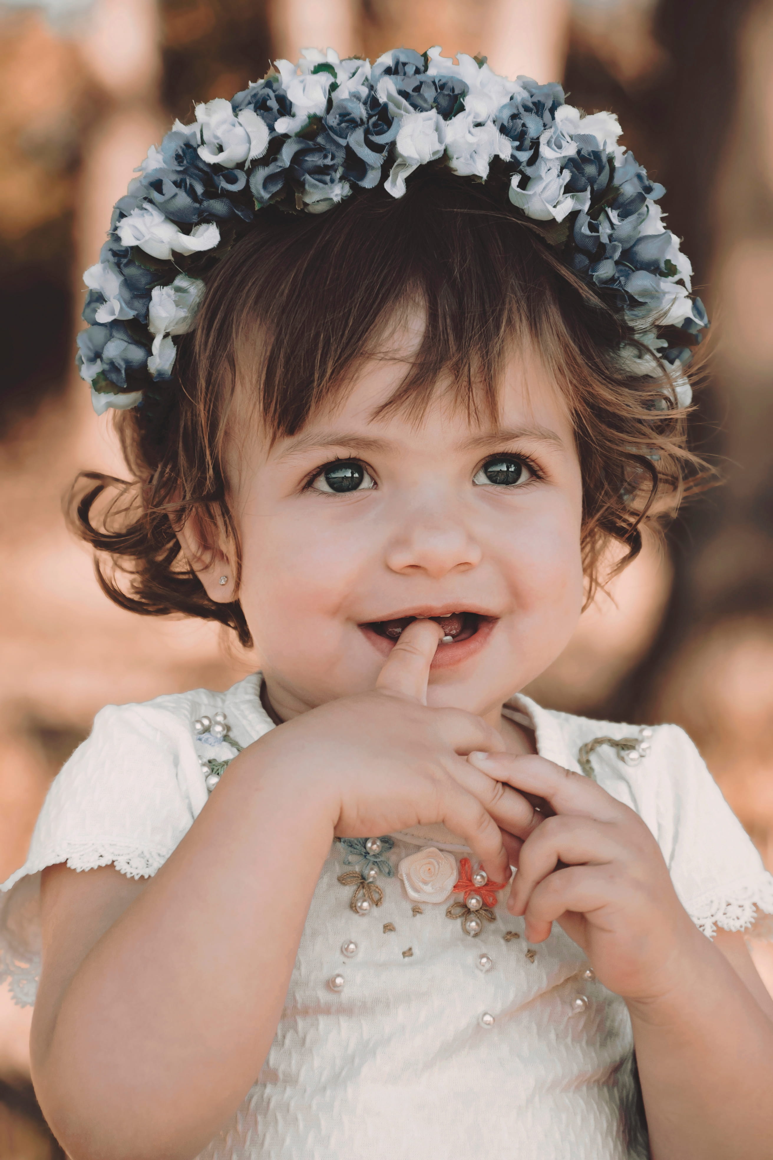 girls, happiness, front view, females, toddler, headshot, close-up, beautiful, girl, smiling, focus on foreground, biting, portrait, innocence, smile, young, Phone HD Wallpaper