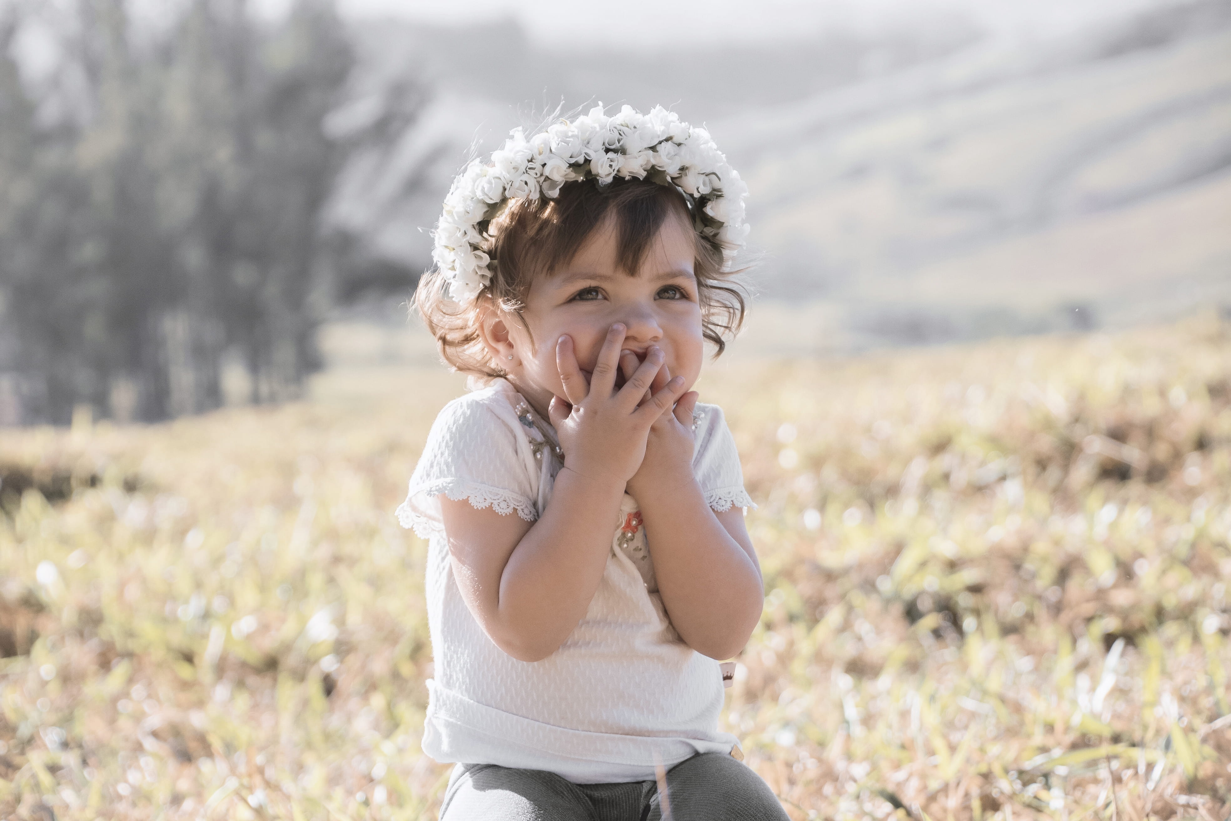 contemplation, day, looking at camera, adorable, girl, real people, innocence, toddler, flower crown, close-up, wearing, smiling, sitting, pretty, child, HD Wallpaper