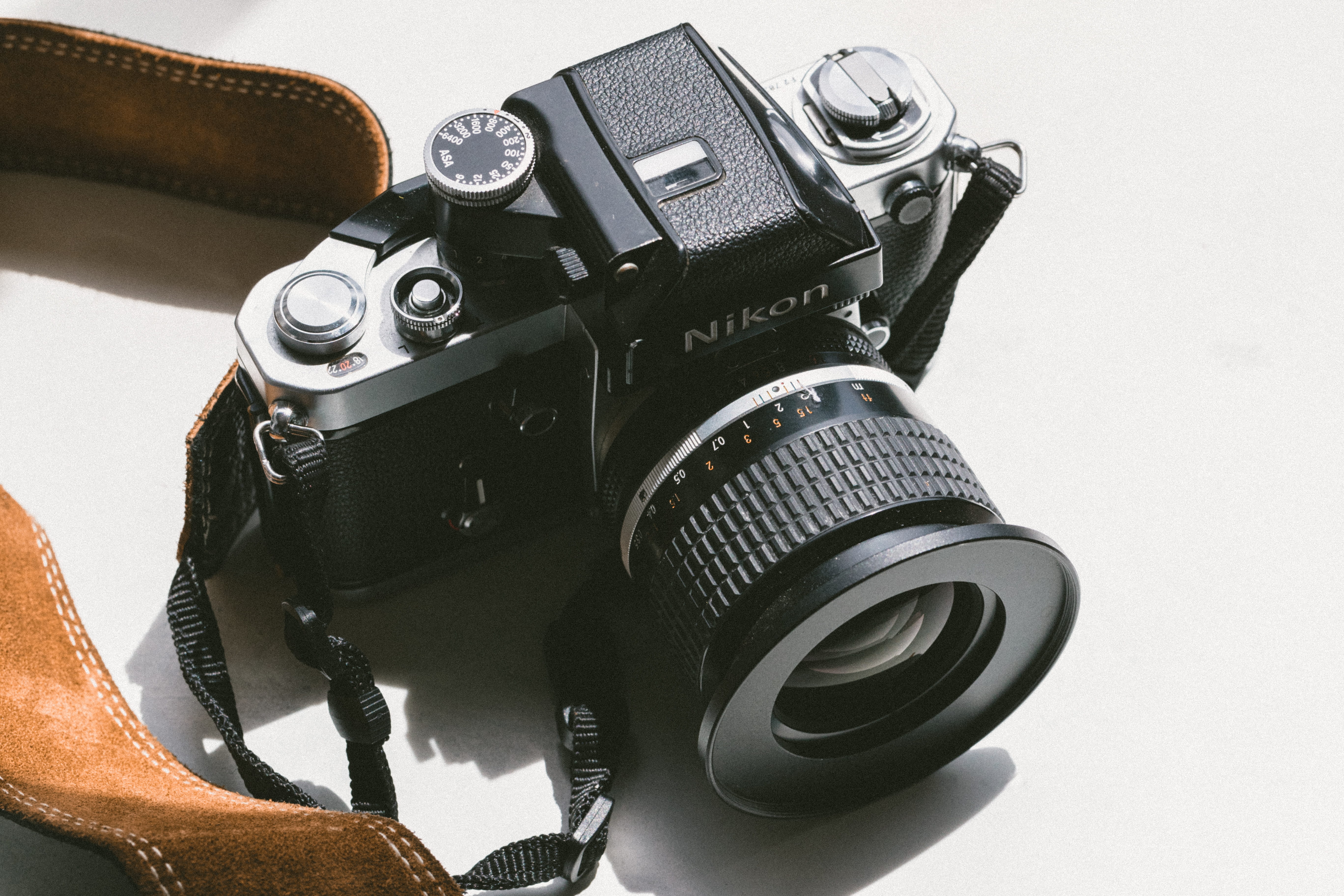 digital single-lens reflex camera, black, still life, lens - eye, photographic equipment, digital camera, technology, strap, nikon camera, nikon, close-up, HD Wallpaper