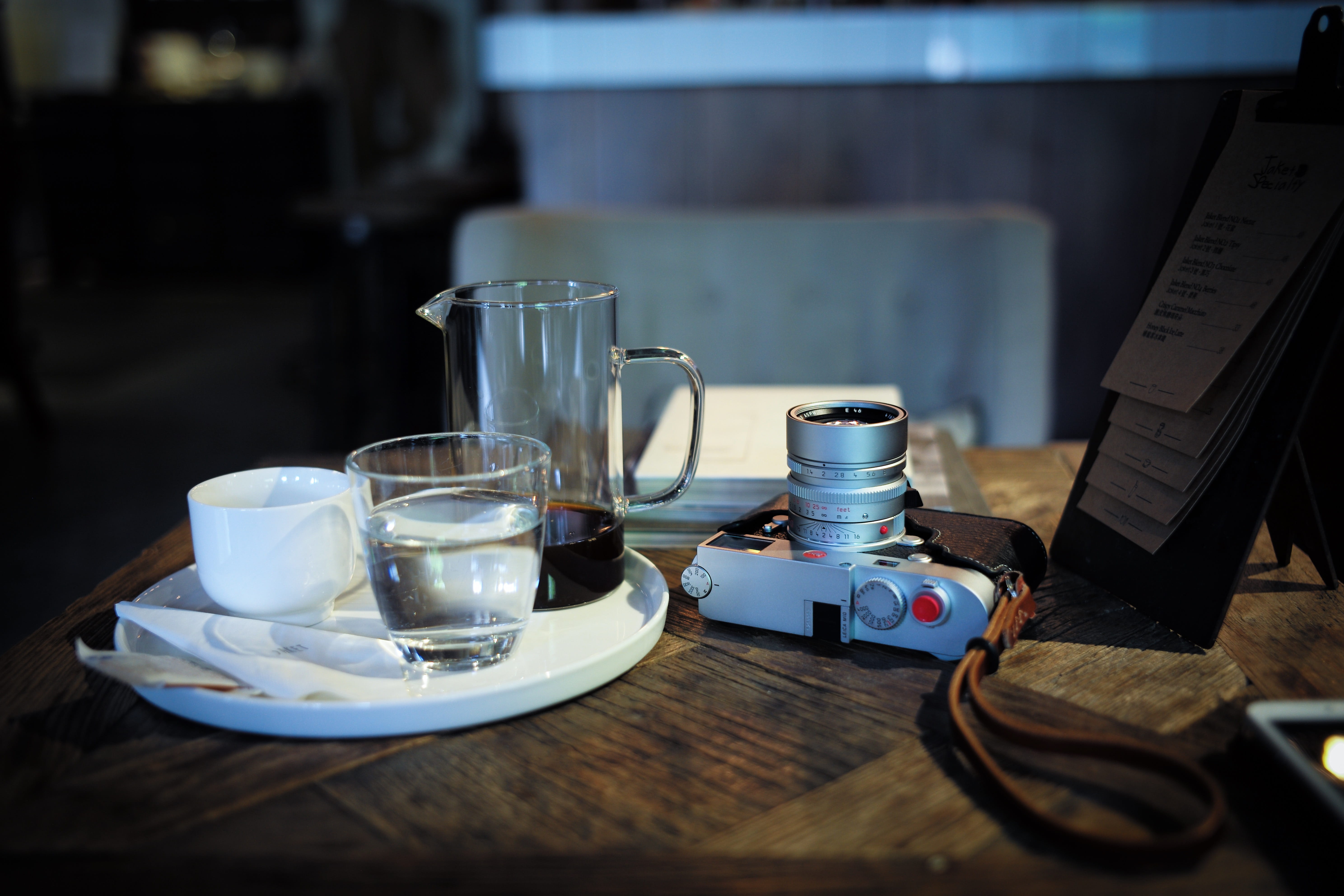 clear, drink, gray, near, close-up, coffee shop, crockery, strap, ceramic, tea cup, 5K, electronics, coffee cup, white, lab, dining table, indoors, wood - material, HD Wallpaper