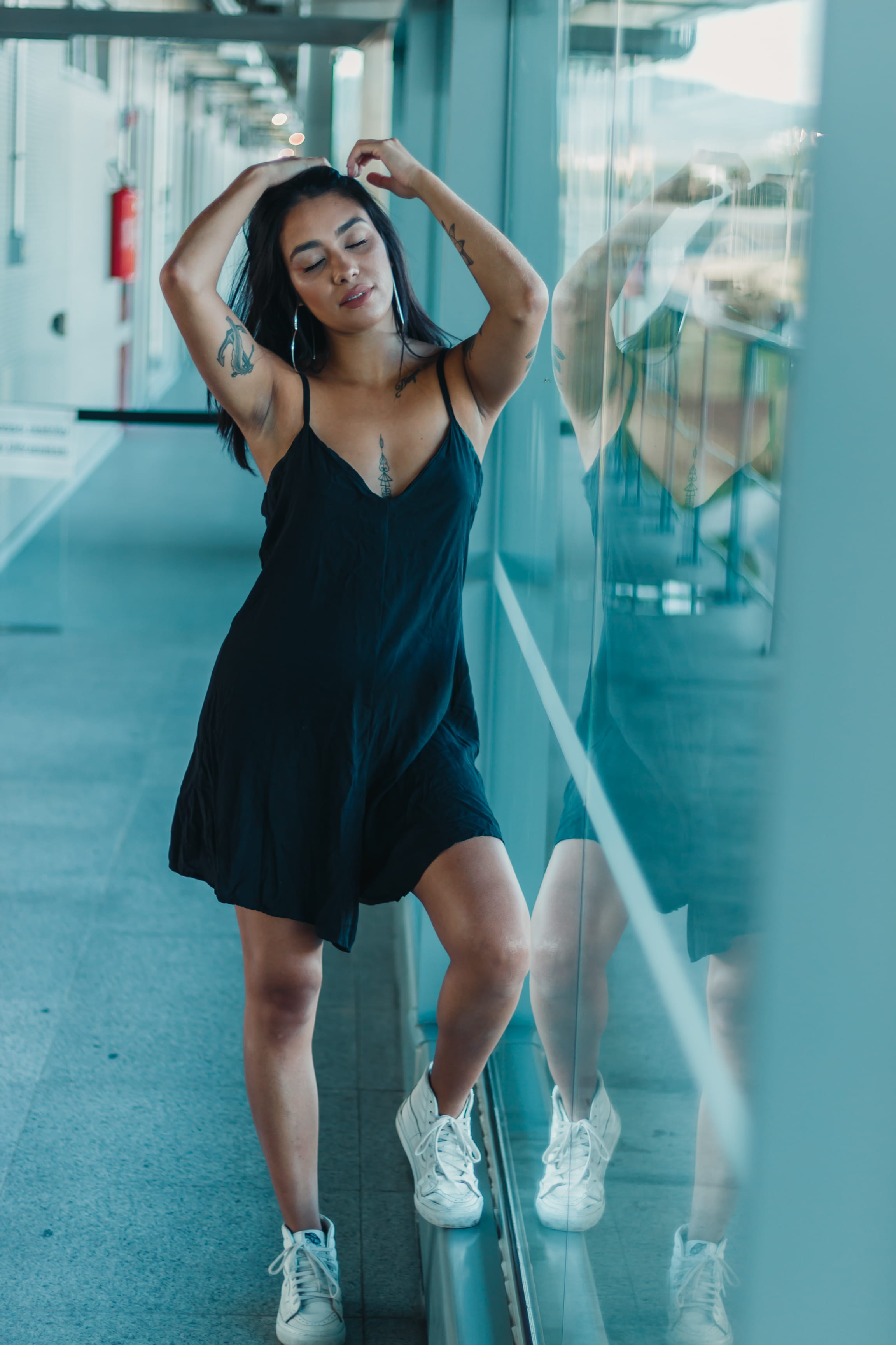 dress, glass wall, sneakers, full length, young adult, leisure, pretty, human arm, posture, strap, beautiful, person, spaghetti, glass, transparent, focus, Phone HD Wallpaper