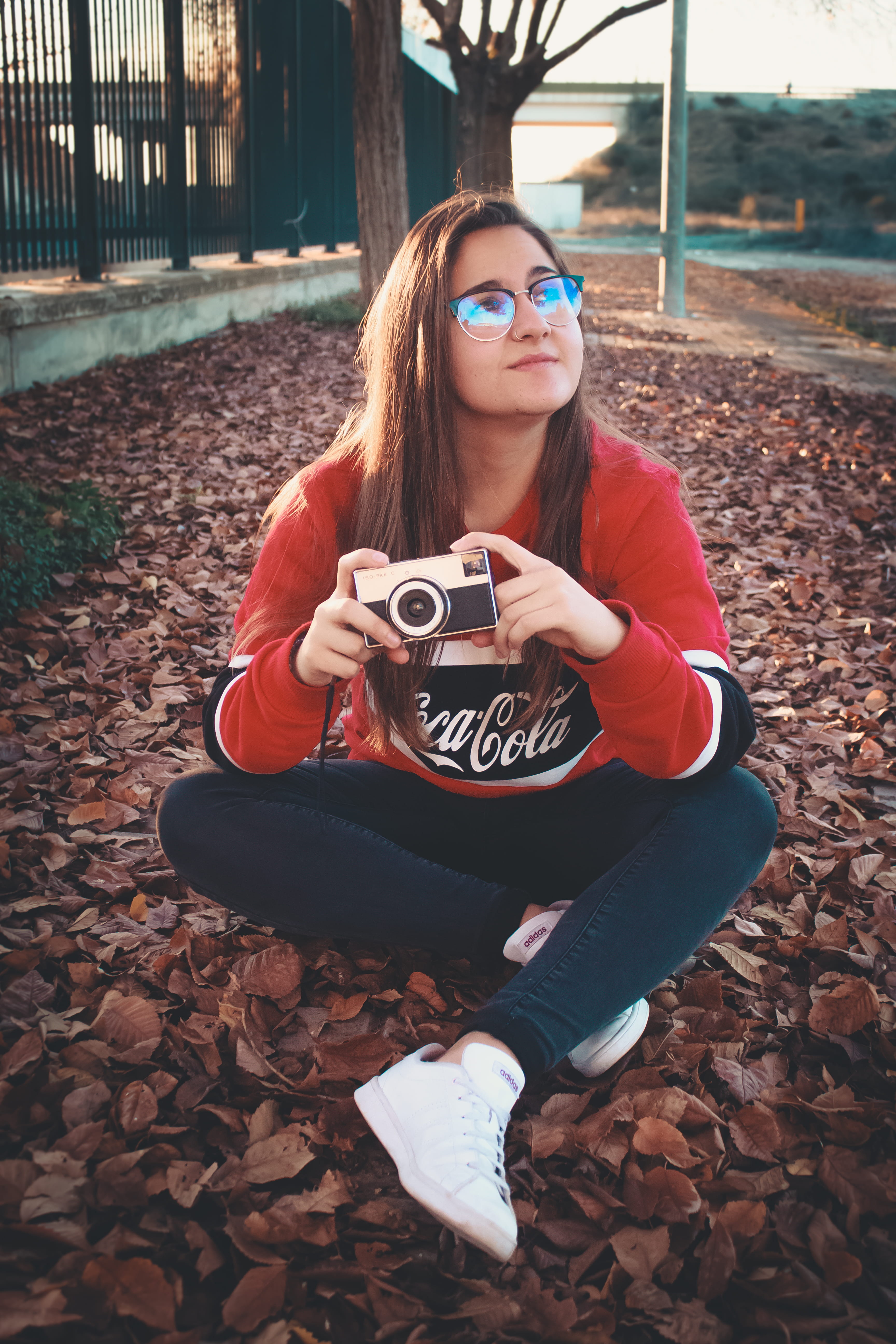 day, full length, real people, teenager, young adult, apparel, sitting, shoe, dslr, technology, front view, accessories, long, accessory, human, camera - photographic equipment, Phone HD Wallpaper