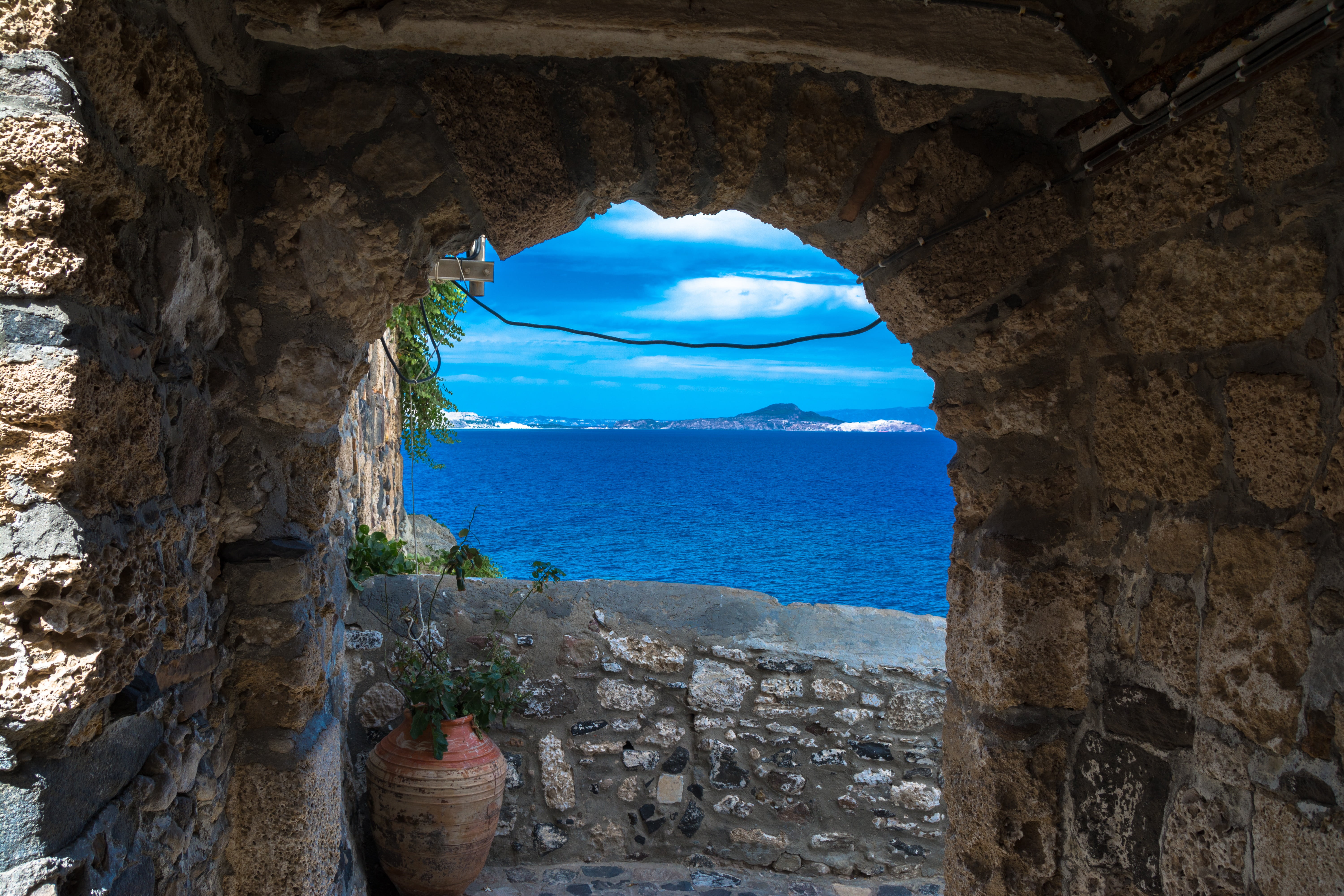 day, 5K, outdoors, solid, blue, landscape, mandraki, rock formation, horizon over water, stone wall, view, summer, water, arch, mediterranean Sea, holiday, HD Wallpaper