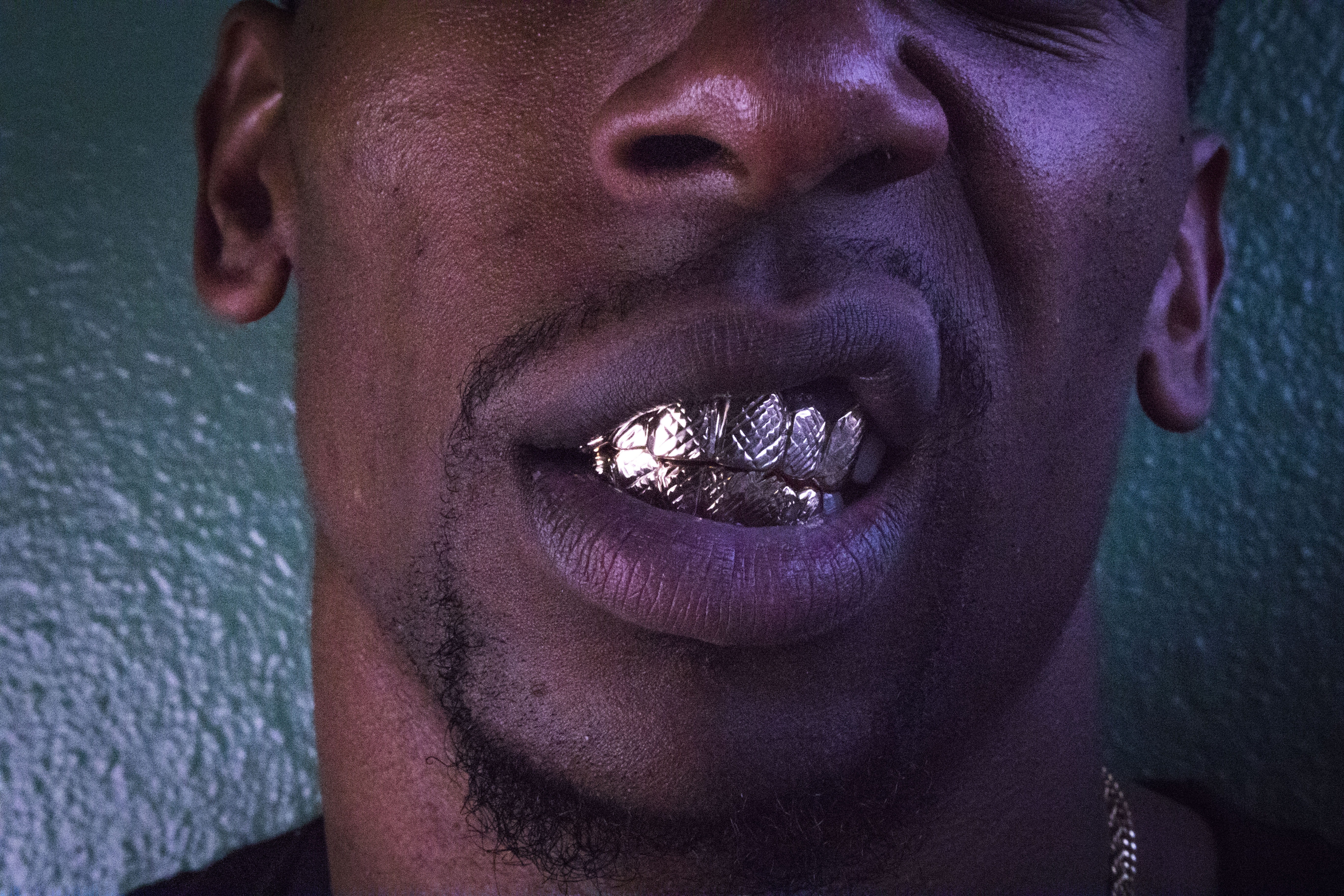 lifestyles, grillz, one person, front view, real people, purple, dental, beard, male, man, portrait, facial hair, young men, gold, human lips, leaning, HD Wallpaper