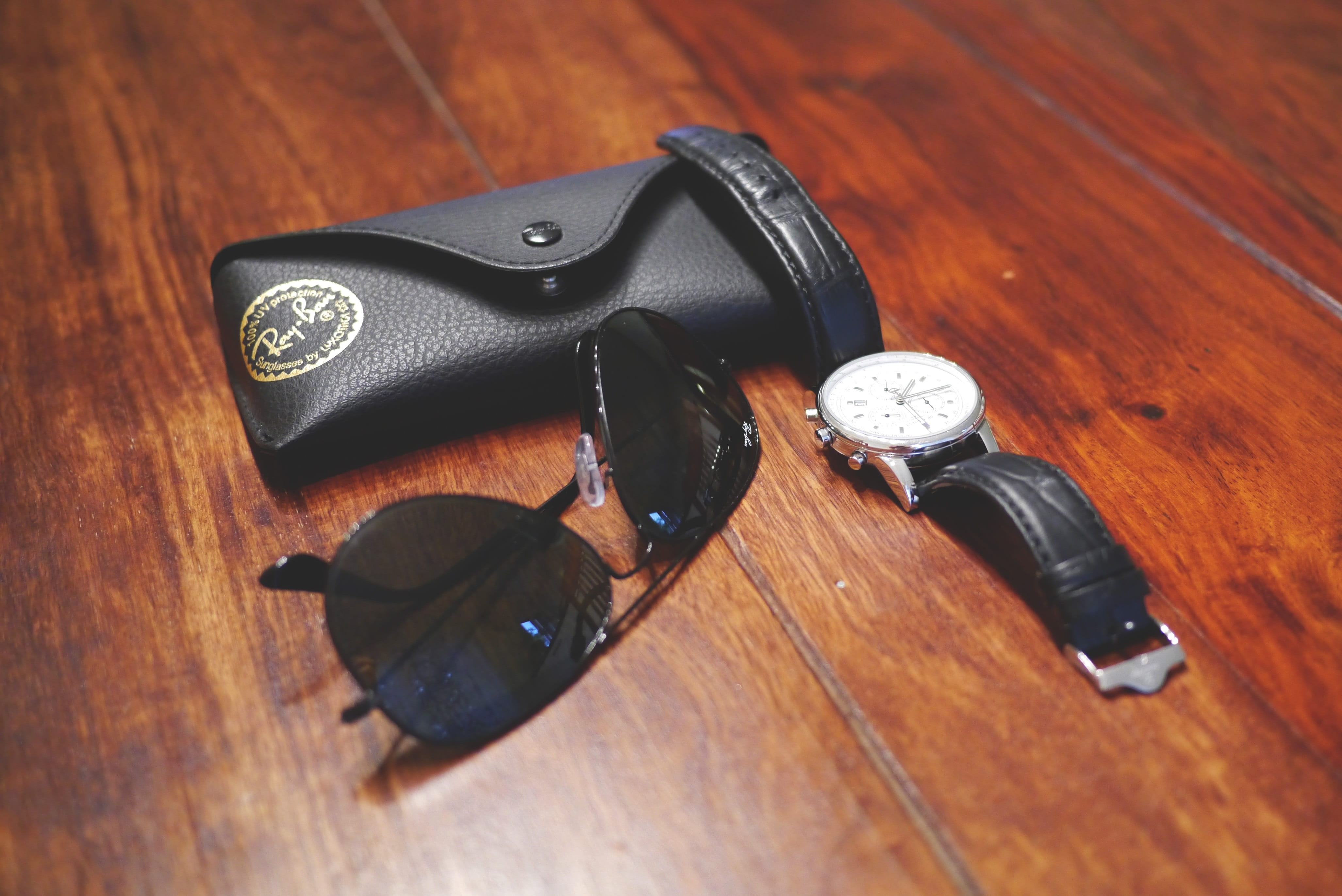 men accessories, table, wood, wooden, indoors, fashion, clock, high angle view, no people, aviators, 4K, beside, case, two objects, watch, focus on foreground, HD Wallpaper