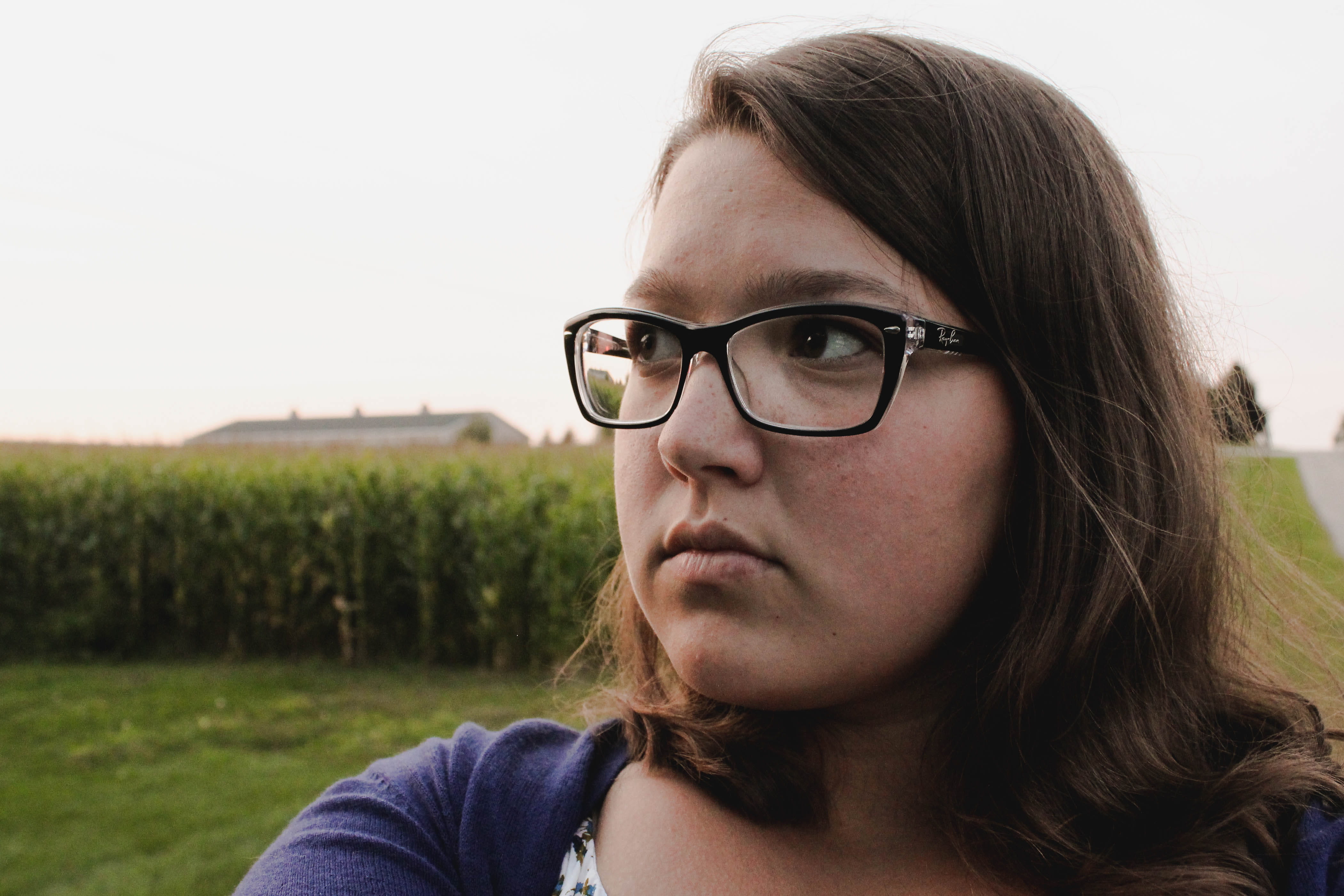 teenager, environment, leisure activity, young women, girl, headshot, field, hairstyle, land, one person, rayban, contemplation, outdoors, glasses, 4K, HD Wallpaper