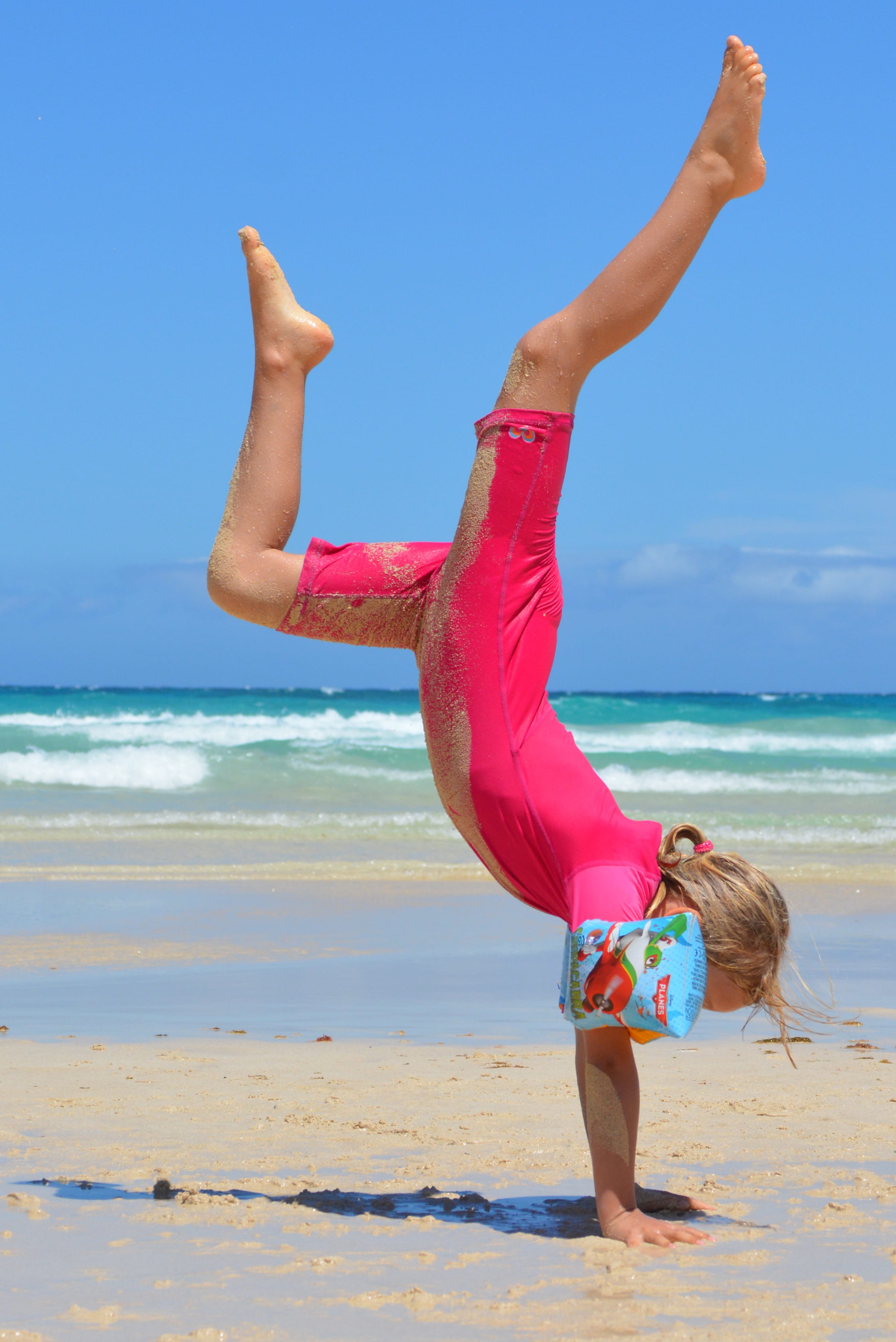 clear sky, Sea, land, horizon over water, full length, Girl, arms raised, handstand, flexibility, agility, barefoot, sky, gymnastics, nature, women, human arm, Phone HD Wallpaper