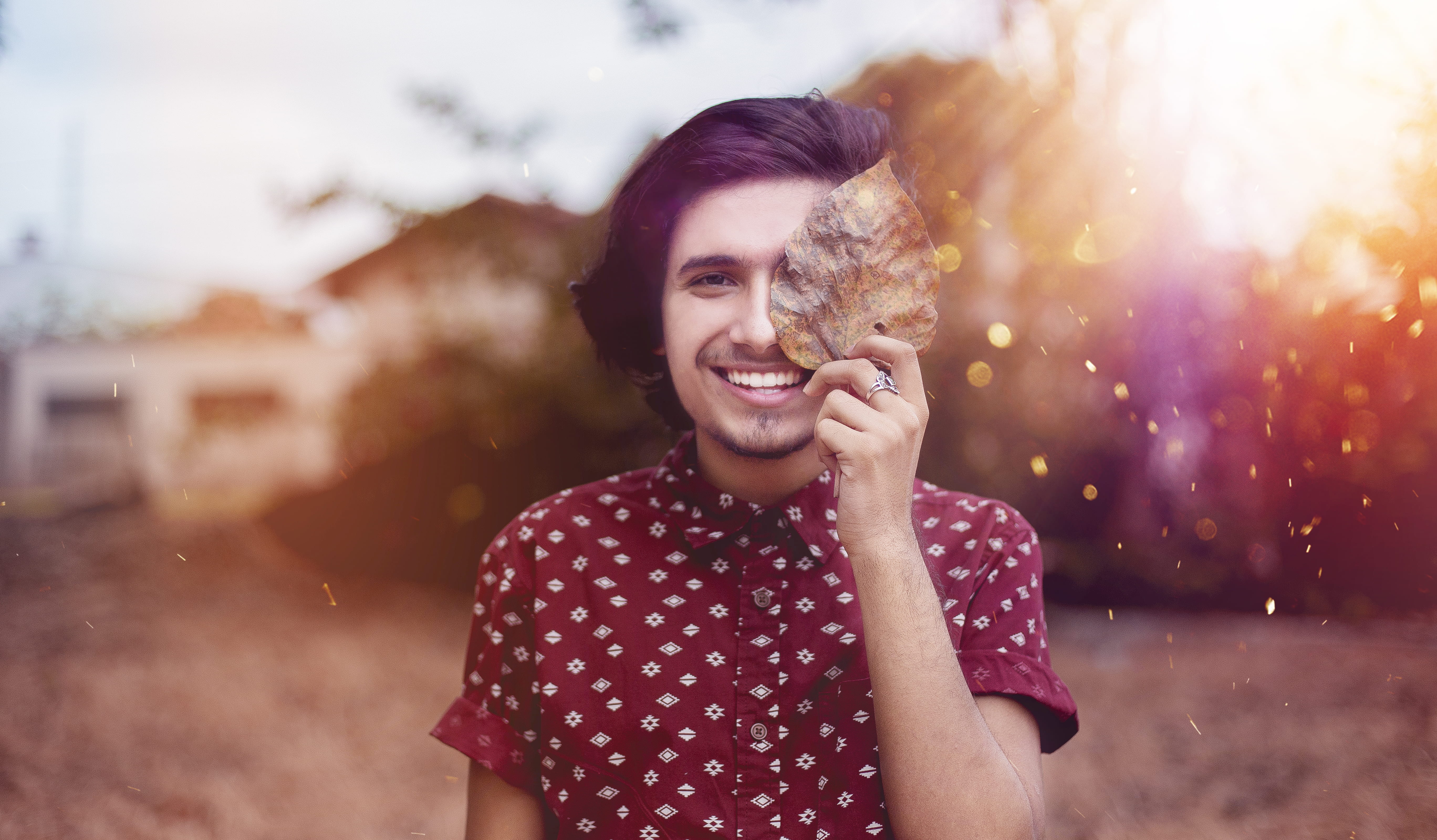 outdoors, fashion, smile, leaf, cheerful, portrait, beautiful people, man, light, cute, young adult, good-looking, architecture, nature, 5K, emotion, waist up, HD Wallpaper