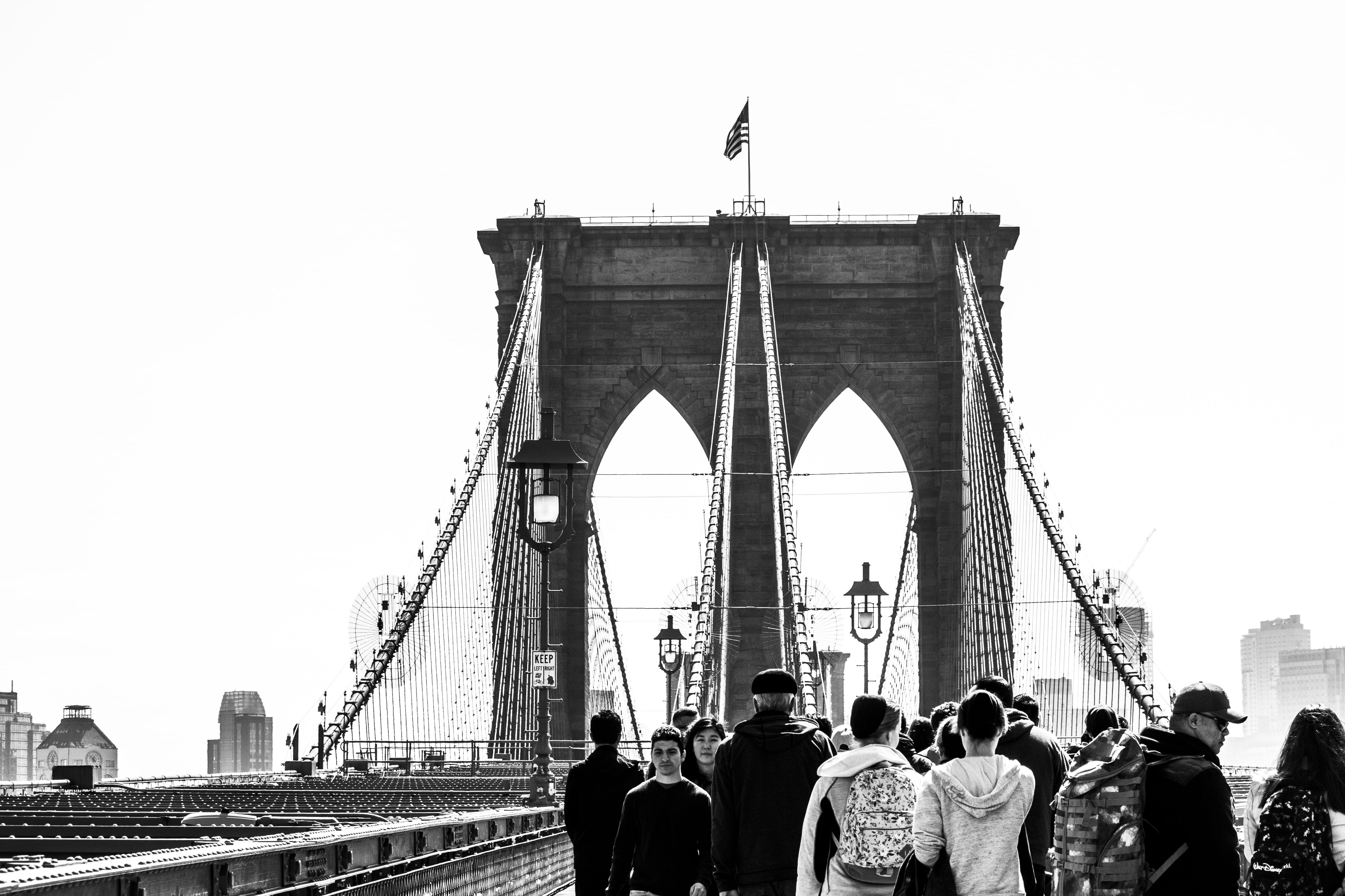 city, vacation, tourism, large group of people, rope bridge, building, urban, real people, nature, overcoat, sky, people, connection, built structure, brooklyn bridge, HD Wallpaper