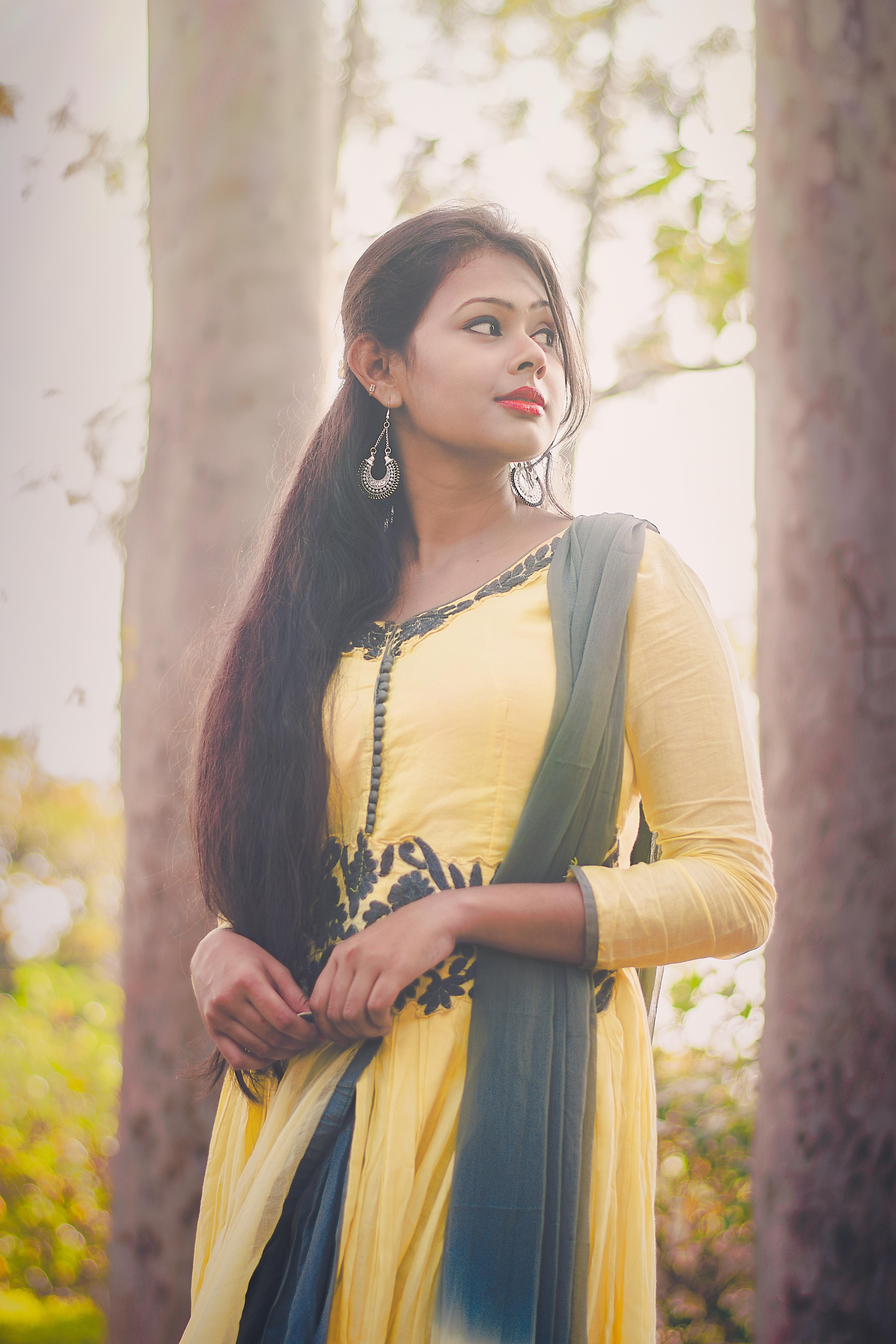 real people, dress, focus on foreground, plant, glamour, beautiful woman, person, female, women, traditional wear, leisure activity, contemplation, woman, Phone HD Wallpaper