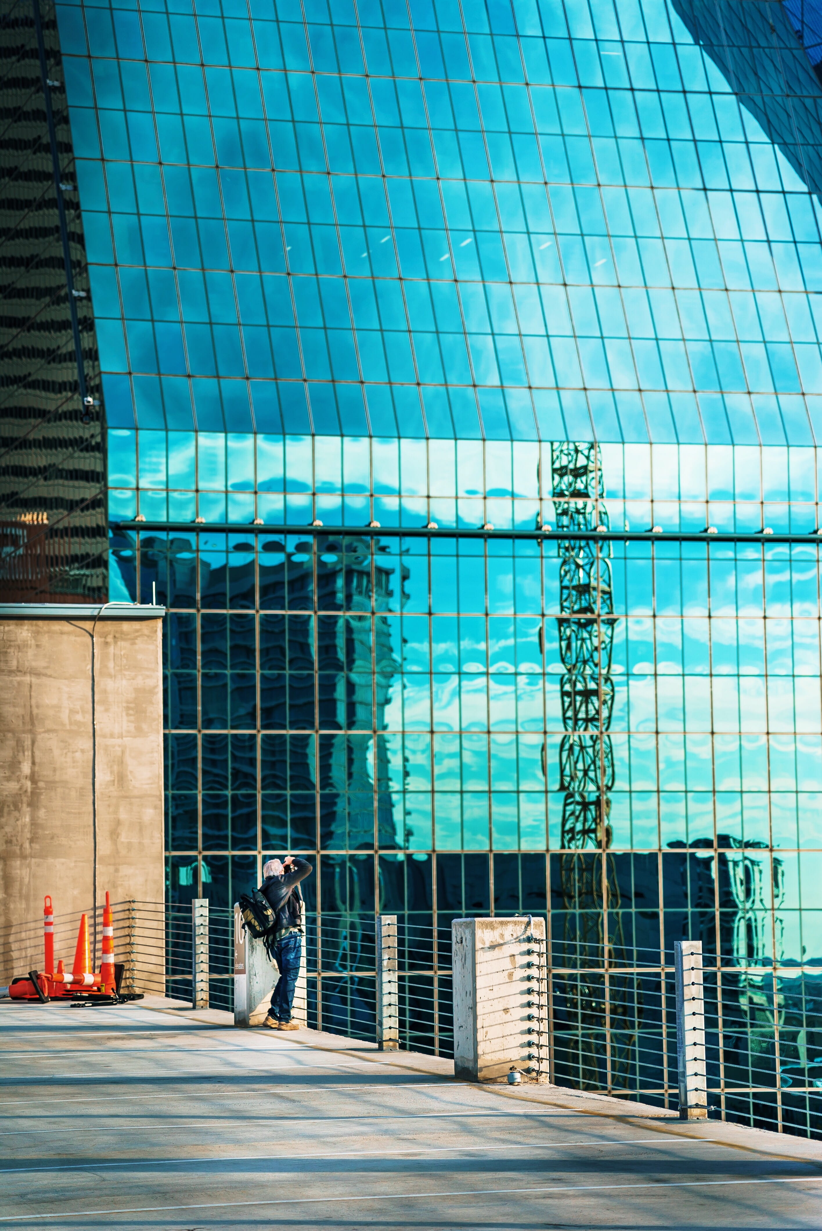 near, fence, lifestyles, person, daytime, men, city, office building exterior, real people, full length, outdoors, glass, leisure activity, building exterior, Phone HD Wallpaper