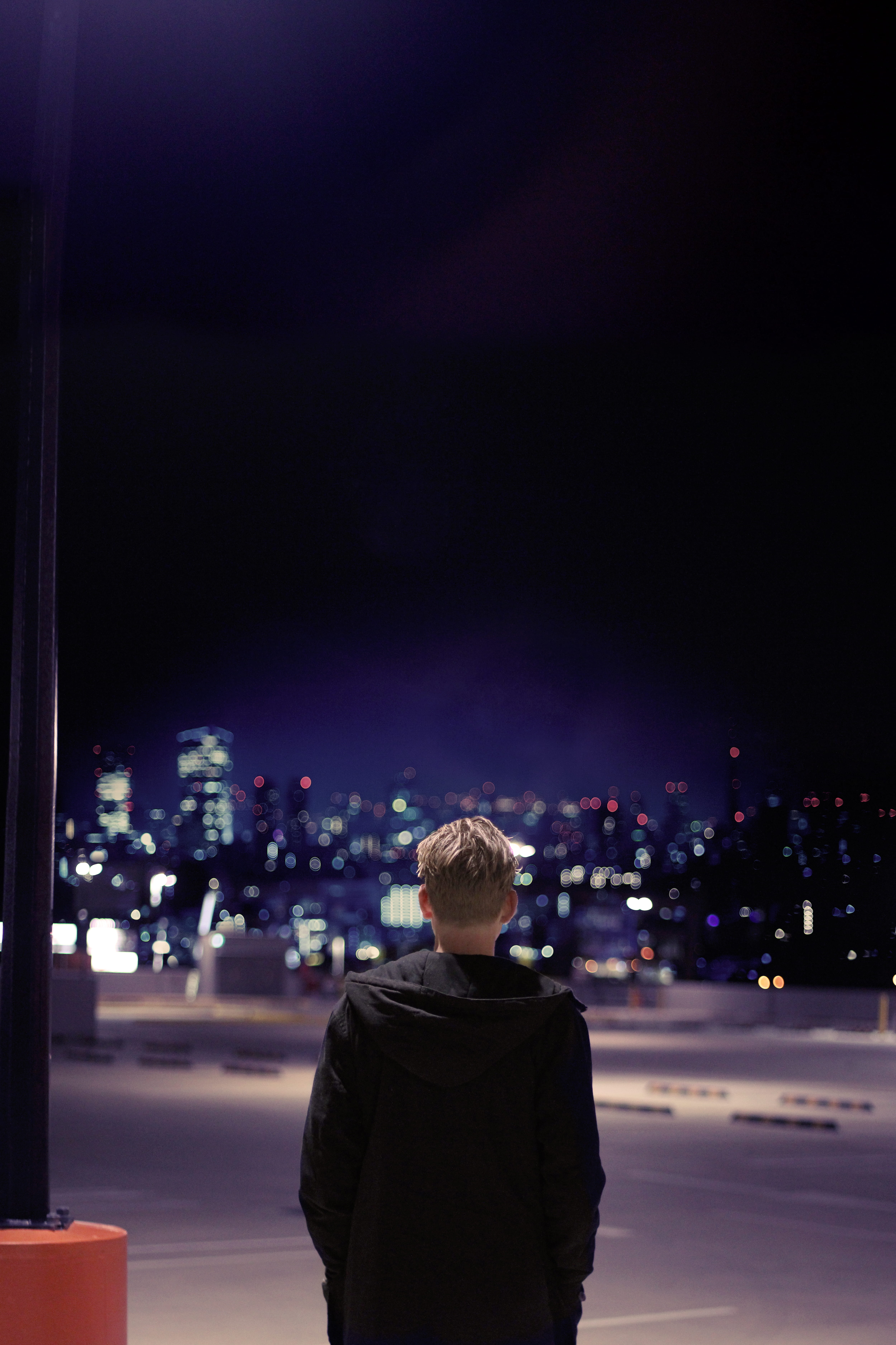 watching, robina town centre, australia, one person, young adult, outdoors, nightlife, rear view, looking, night, jacket, men, city, people, looking at view, Phone HD Wallpaper
