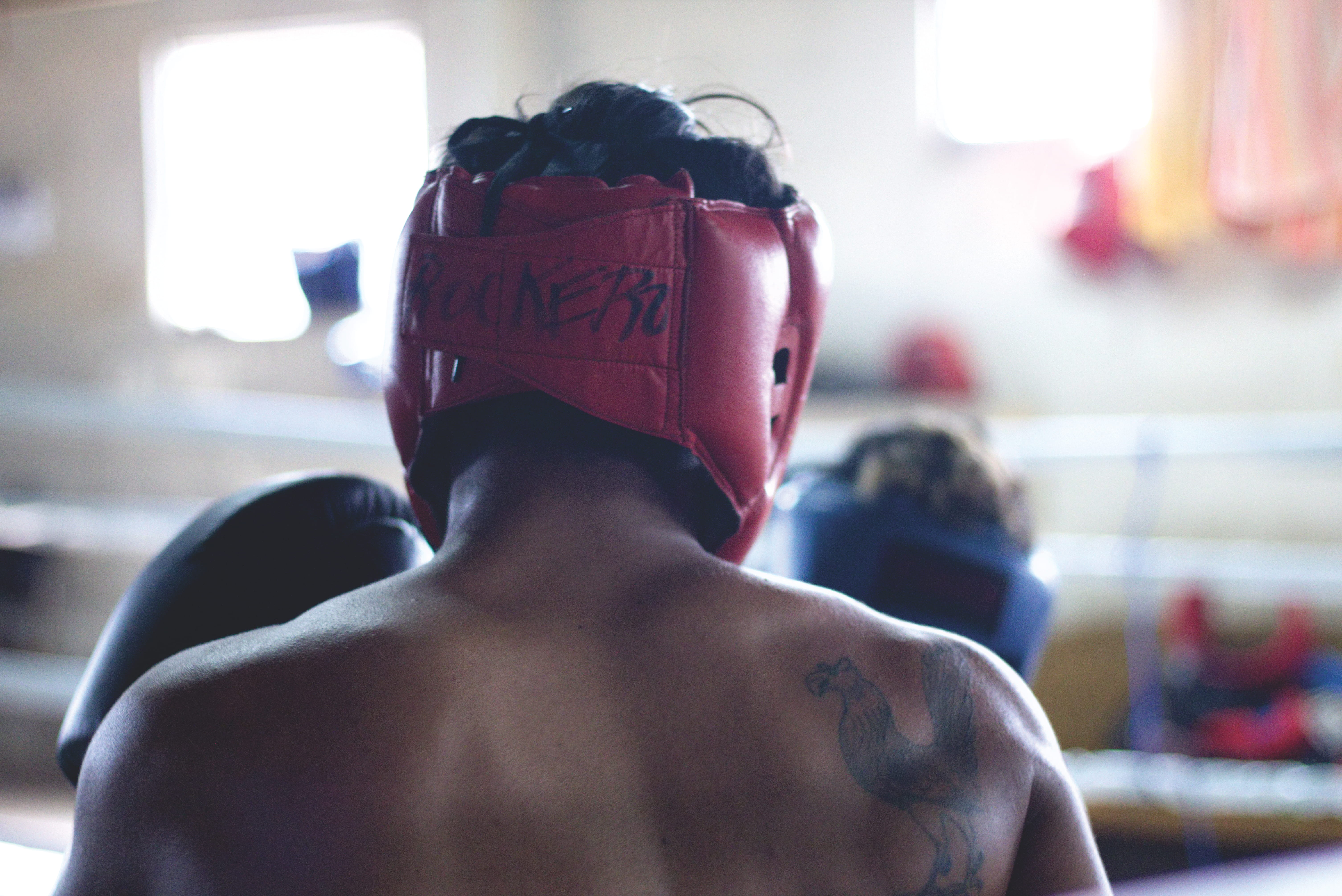 boxing glove, boxing, red, focus on foreground, sport, portrait, person, young men, strength, tattoo, competition, headshot, head gear, glove, un, adult, HD Wallpaper