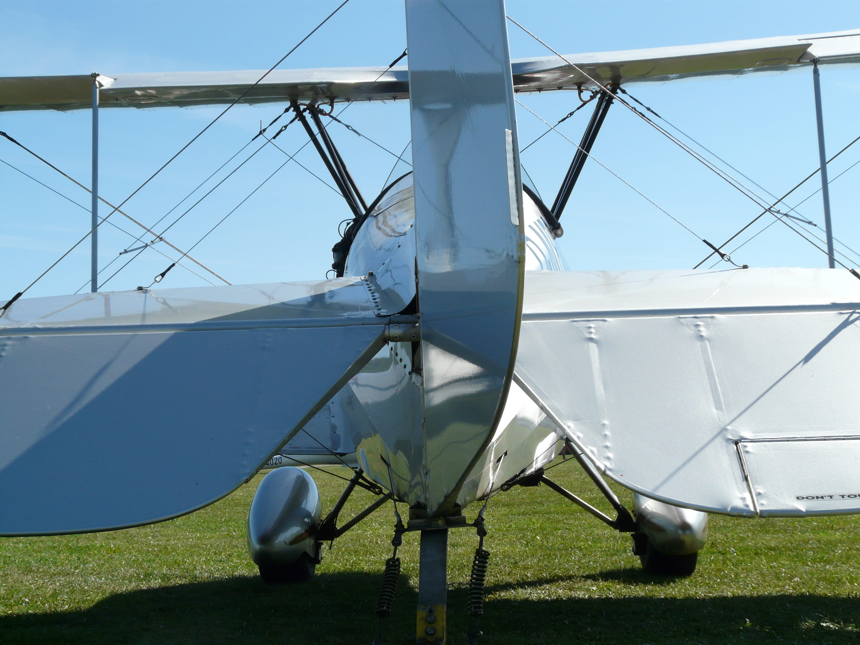plant, field, 2K, rear view, day, silver, Aerobatics, air vehicle, Aircraft, travel, shadow, no people, outdoors, rudder, land, aircraft wing, airplane, HD Wallpaper