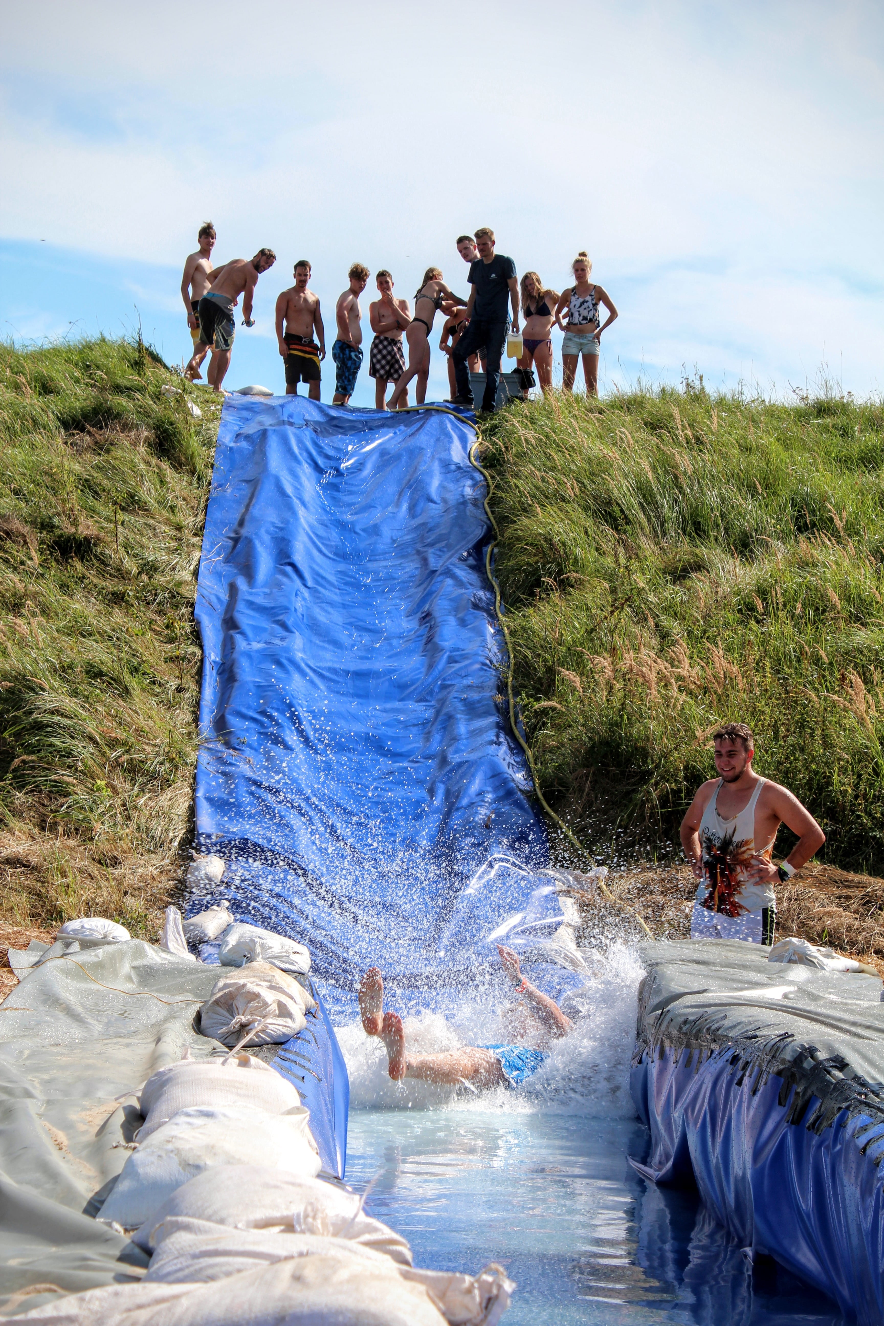 slope, lifestyles, group of people, 5K, grass, land, togetherness, sky, crowd, women, eigenbau, water slide, field, nature, slip, people, adult, outdoors, Phone HD Wallpaper