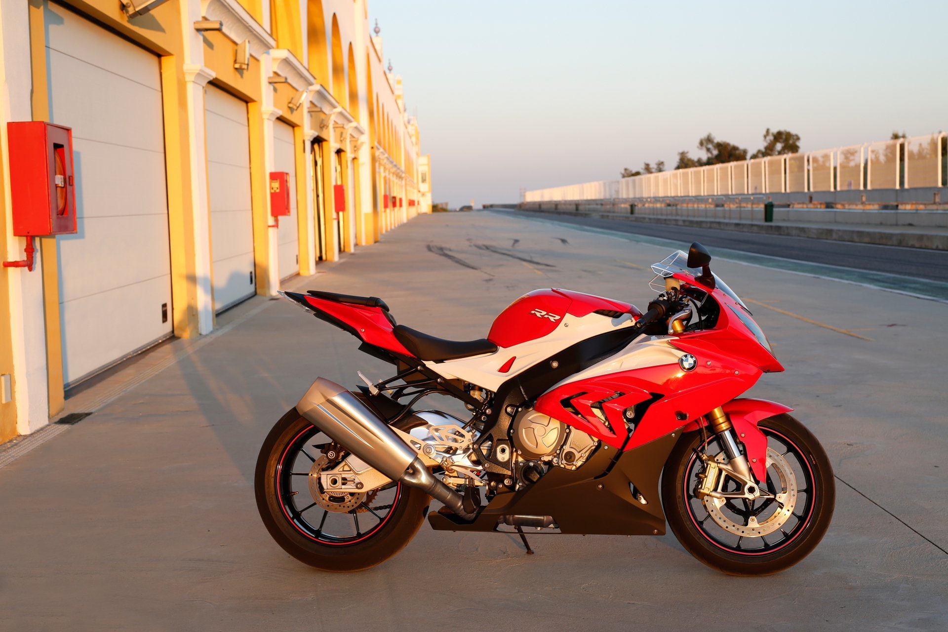 road, street, architecture, one person, Vehicle, Motorcycle, transportation, mode of transportation, side view, red, BMW S1000, day, BMW S1000RR, sky, stationary, HD Wallpaper