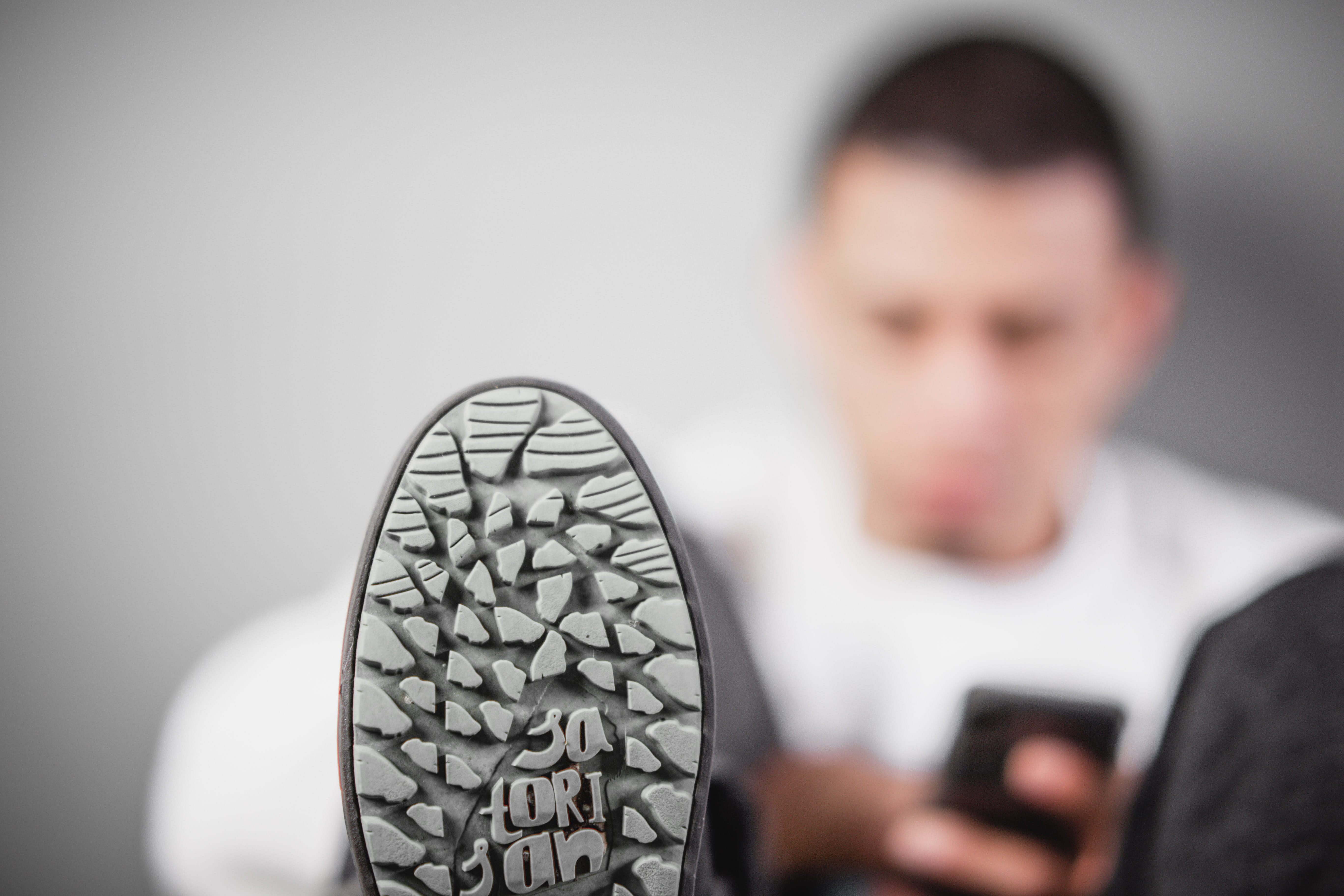 focus on foreground, copy space, 5K, staring, guy, one person, wear, shoe, selective, holding, fashion, close-up, beside, front view, busy, blurred background, HD Wallpaper