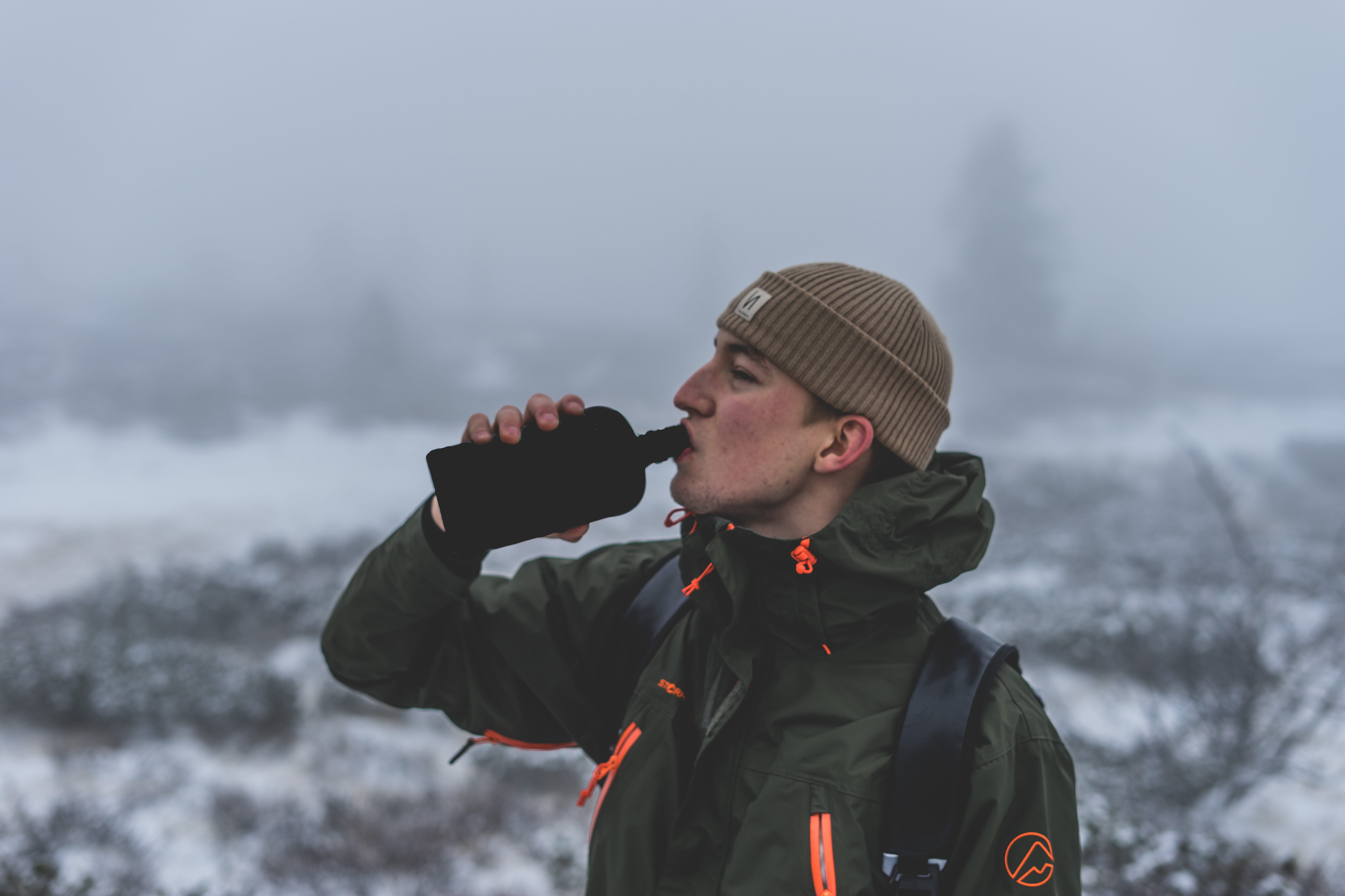 real people, young adult, snow, bottle, flask, winter, man, outdoors, waist up, activity, drink, young men, drinking, men, clothing, male, cold temperature, HD Wallpaper