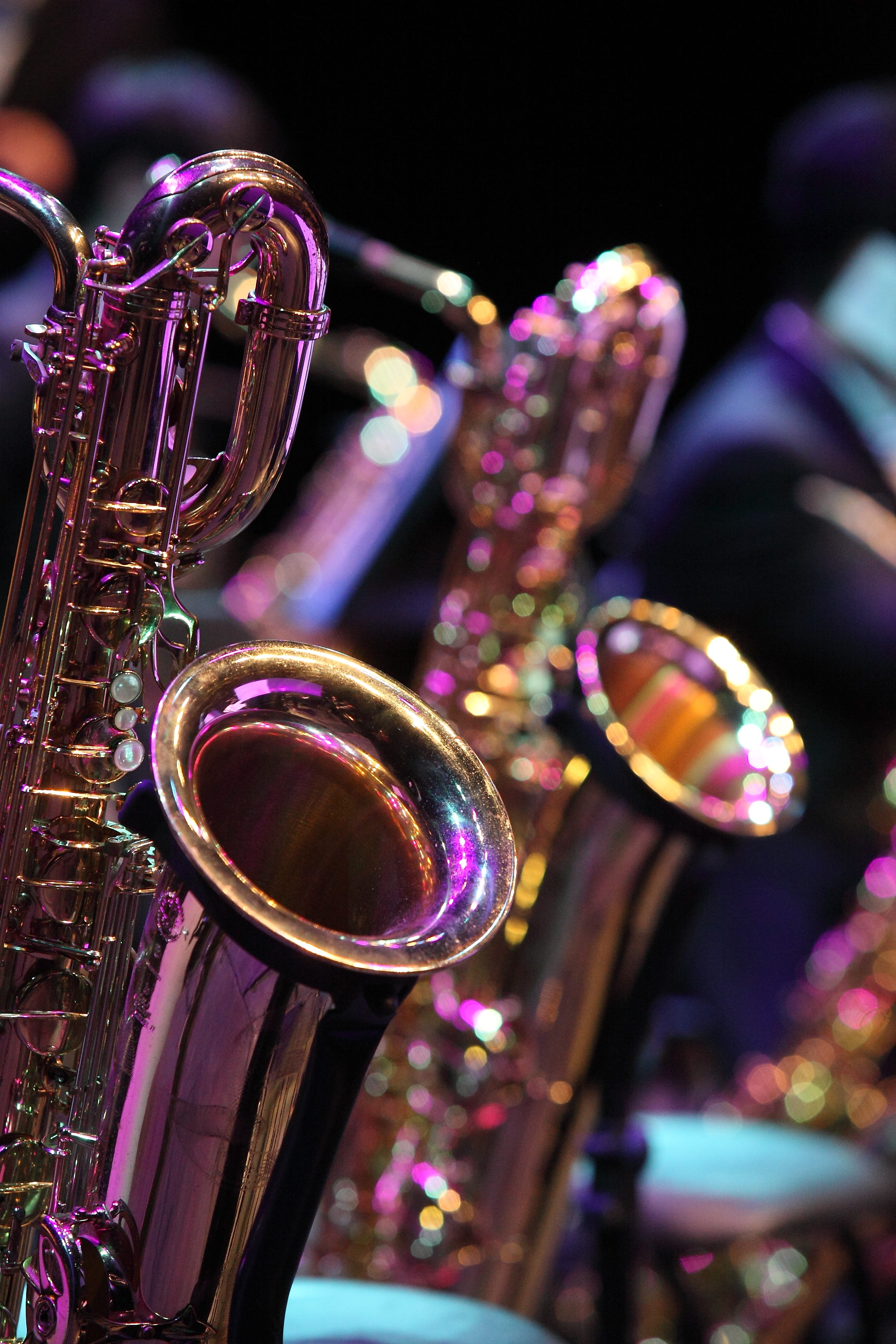 saxophone, performance, stage, selective focus, arts culture and entertainment, orchestra, instrument, played, illuminated, brass instrument, indoors, wind instrument, Phone HD Wallpaper