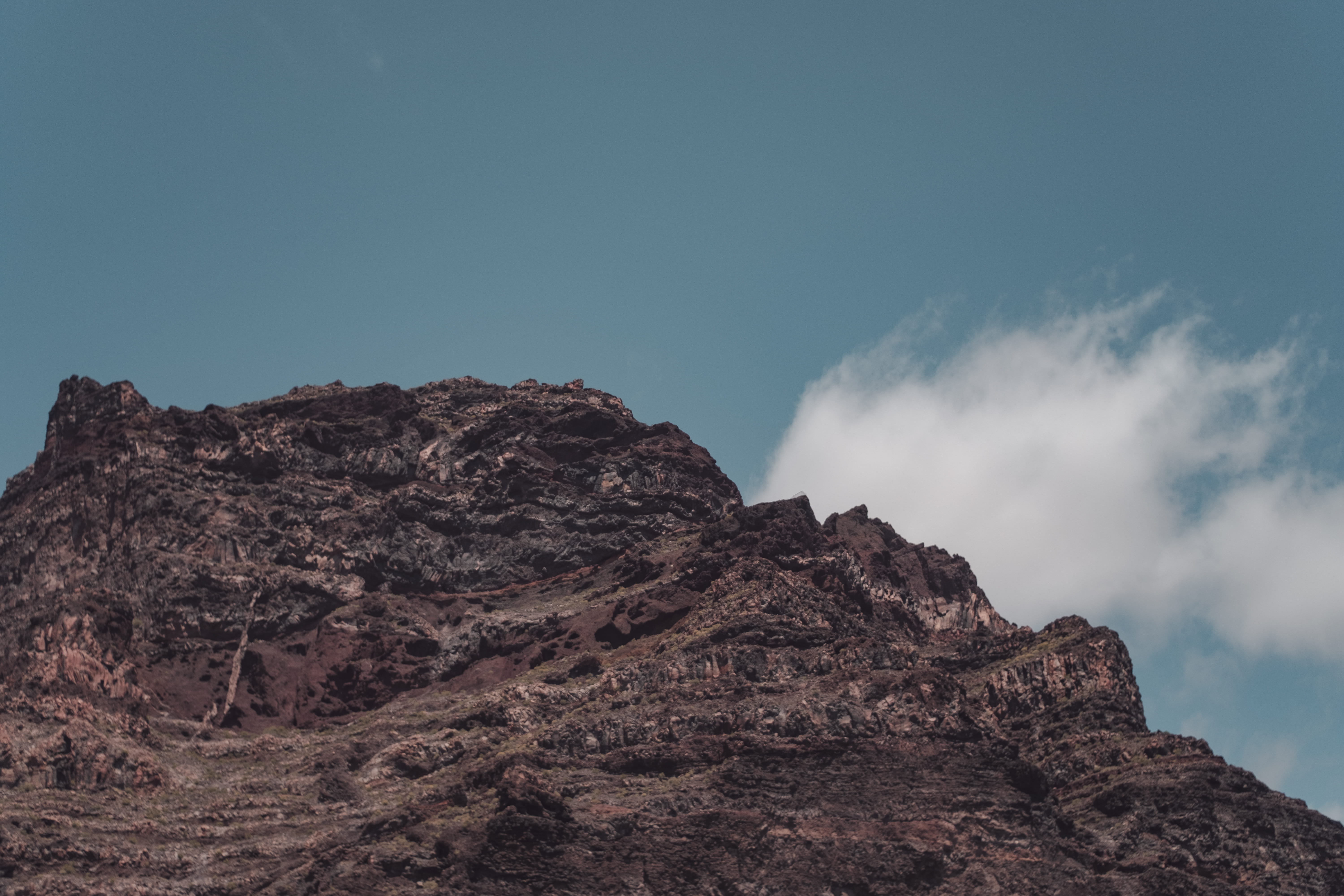 clouds, path, tranquil scene, outdoors, high, beauty in nature, eroded, 5K, rock - object, 28mm, rocks, vintage, blue, mountain peak, sky, arid climate, HD Wallpaper