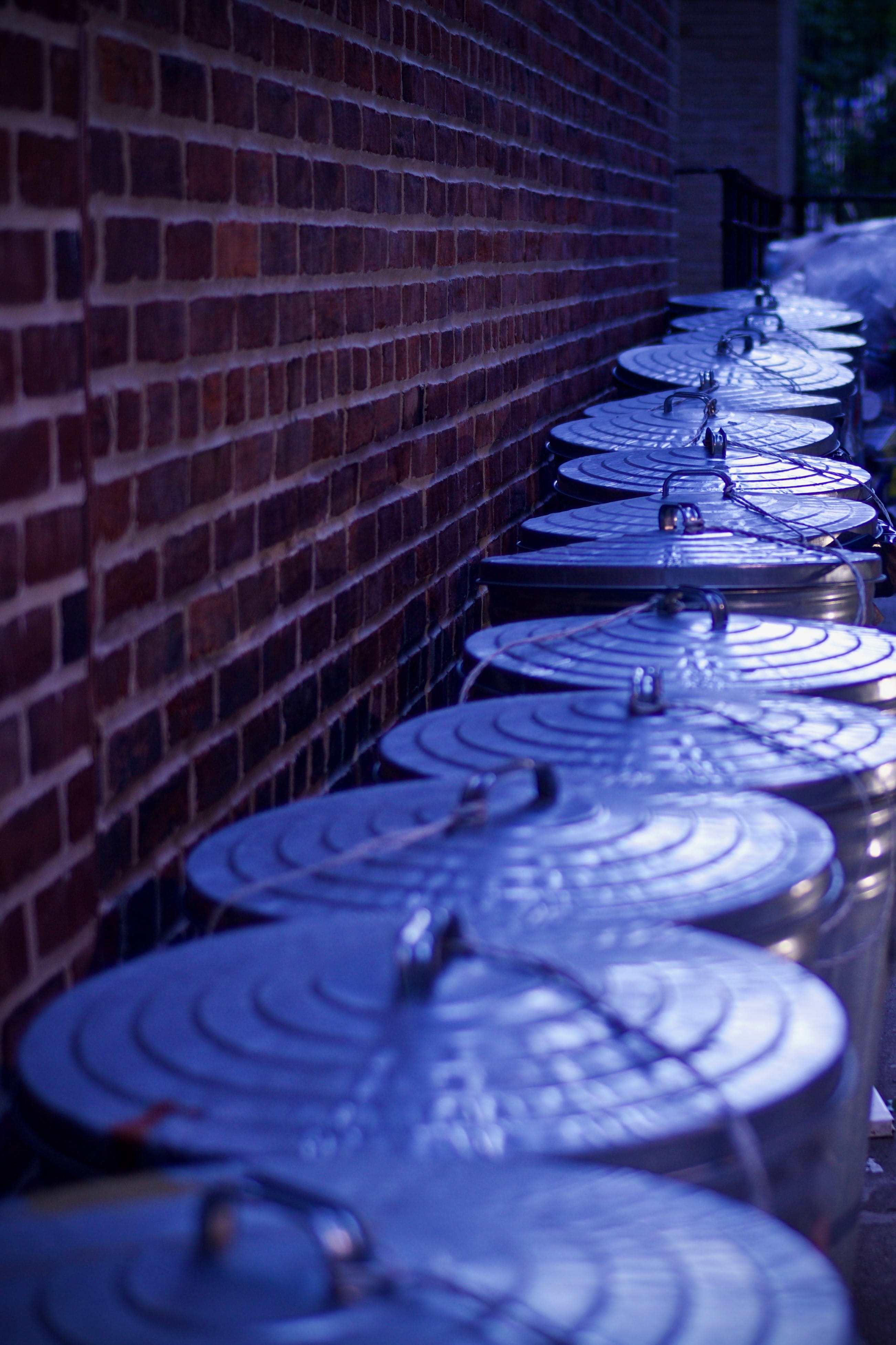stainless, blue, stack, urban, household equipment, in a row, focus on foreground, pavement, night, trash can, architecture, close-up, human, selective focus, Phone HD Wallpaper