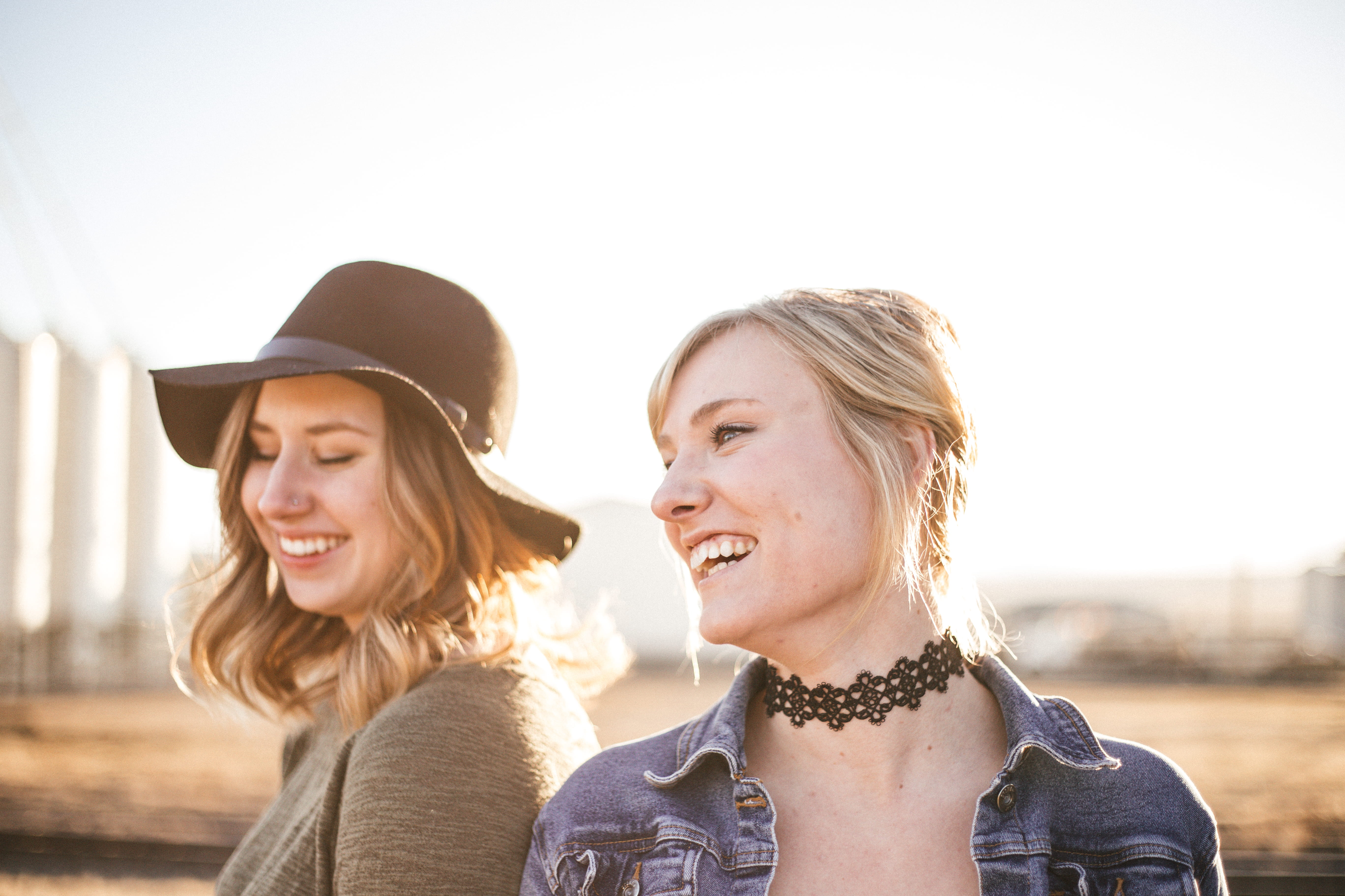 laughter, portrait, woman, friend, selfie, standing, laugh, sunlight, hat, gray, curly, young adult, taking, smile, positive emotion, hair, beside, denim, HD Wallpaper