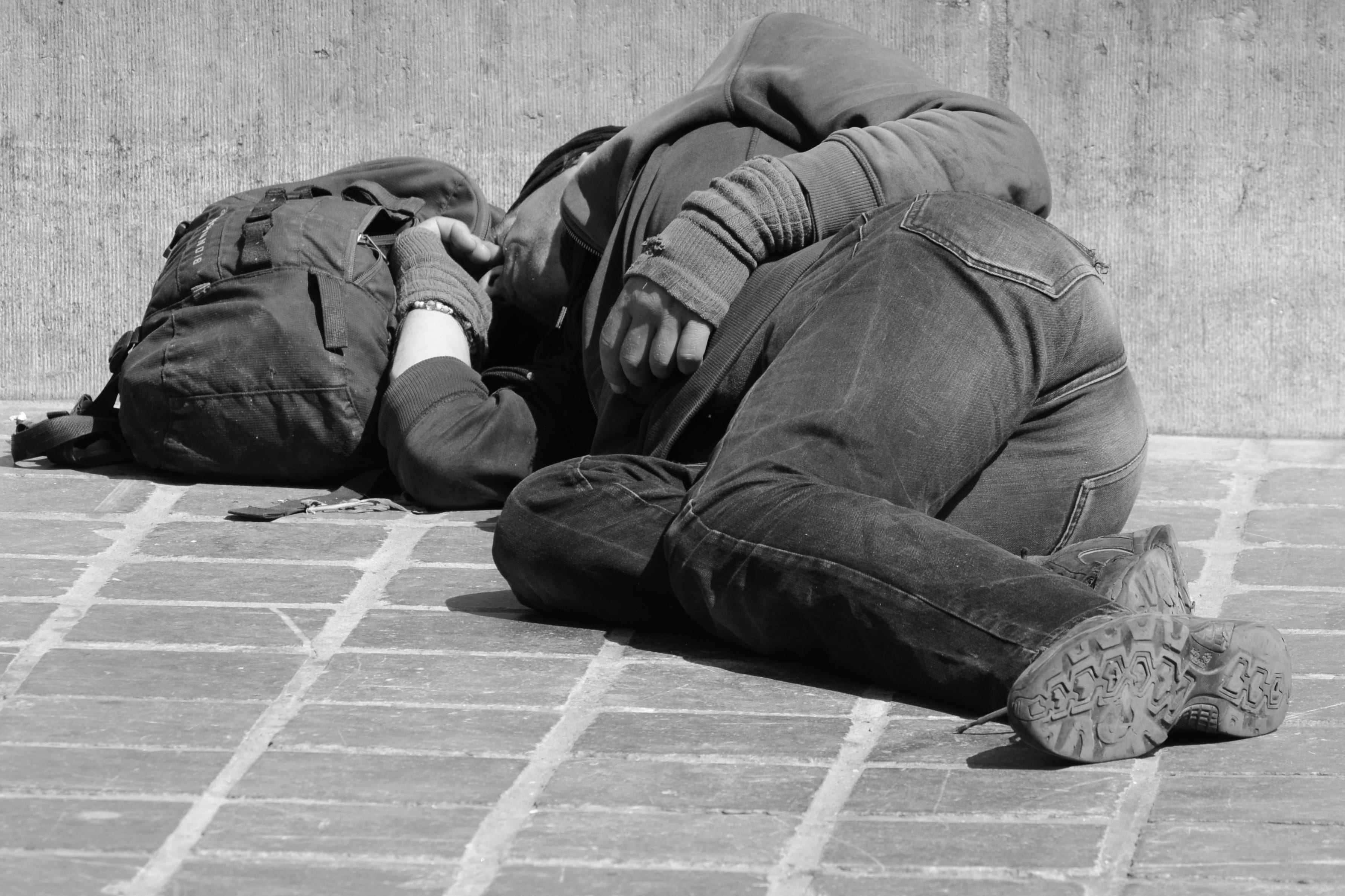 street, casual clothing, clothing, grayscale, near, photography, full length, real people, wearing, city, resting, 2K, jacket, lying down, sleeping, bag, HD Wallpaper