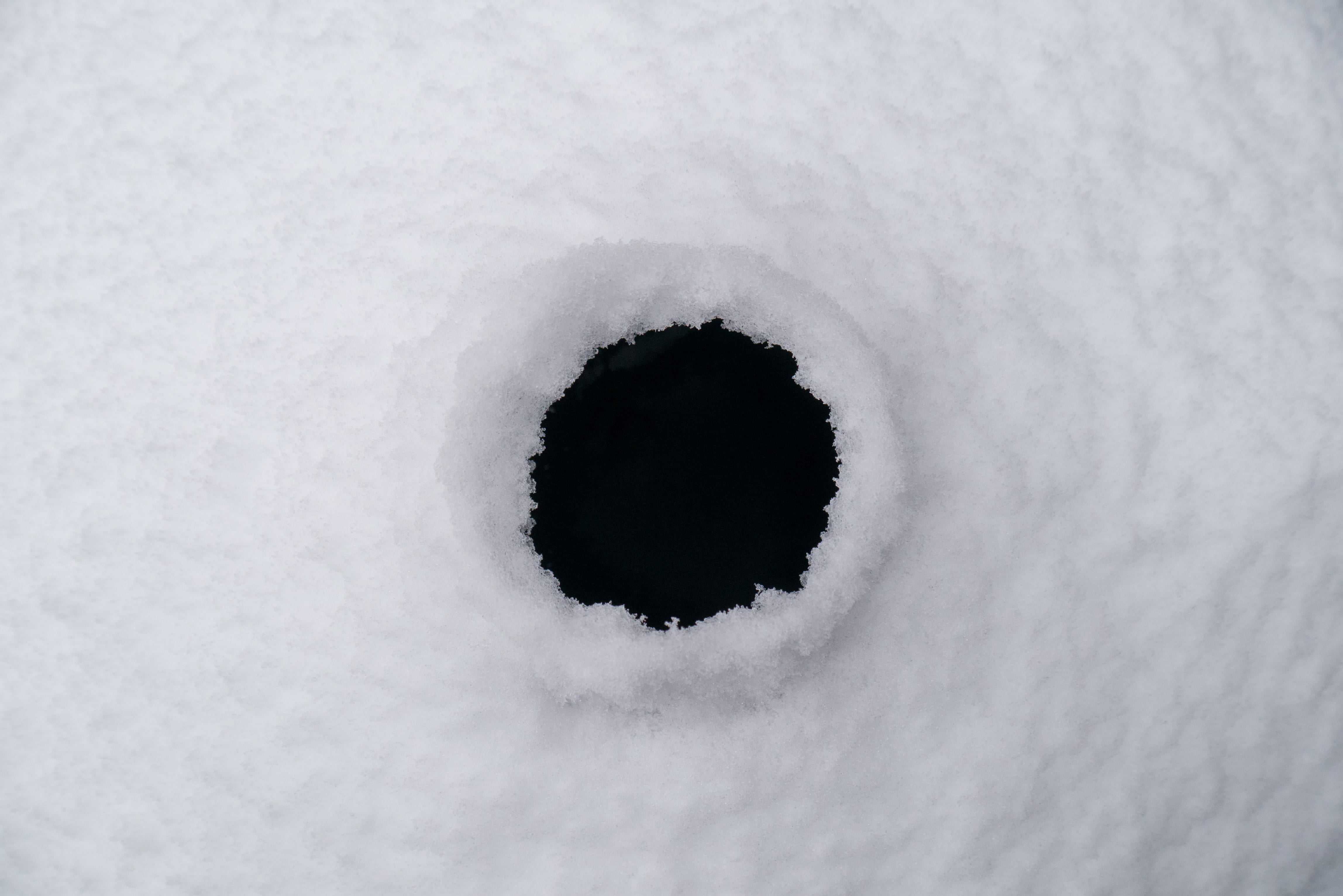 white color, beauty in nature, outdoors, bleak, solitary, snow, backgrounds, black, 4K, cold temperature, no people, frozen, darkness, ice, hole, full frame, HD Wallpaper