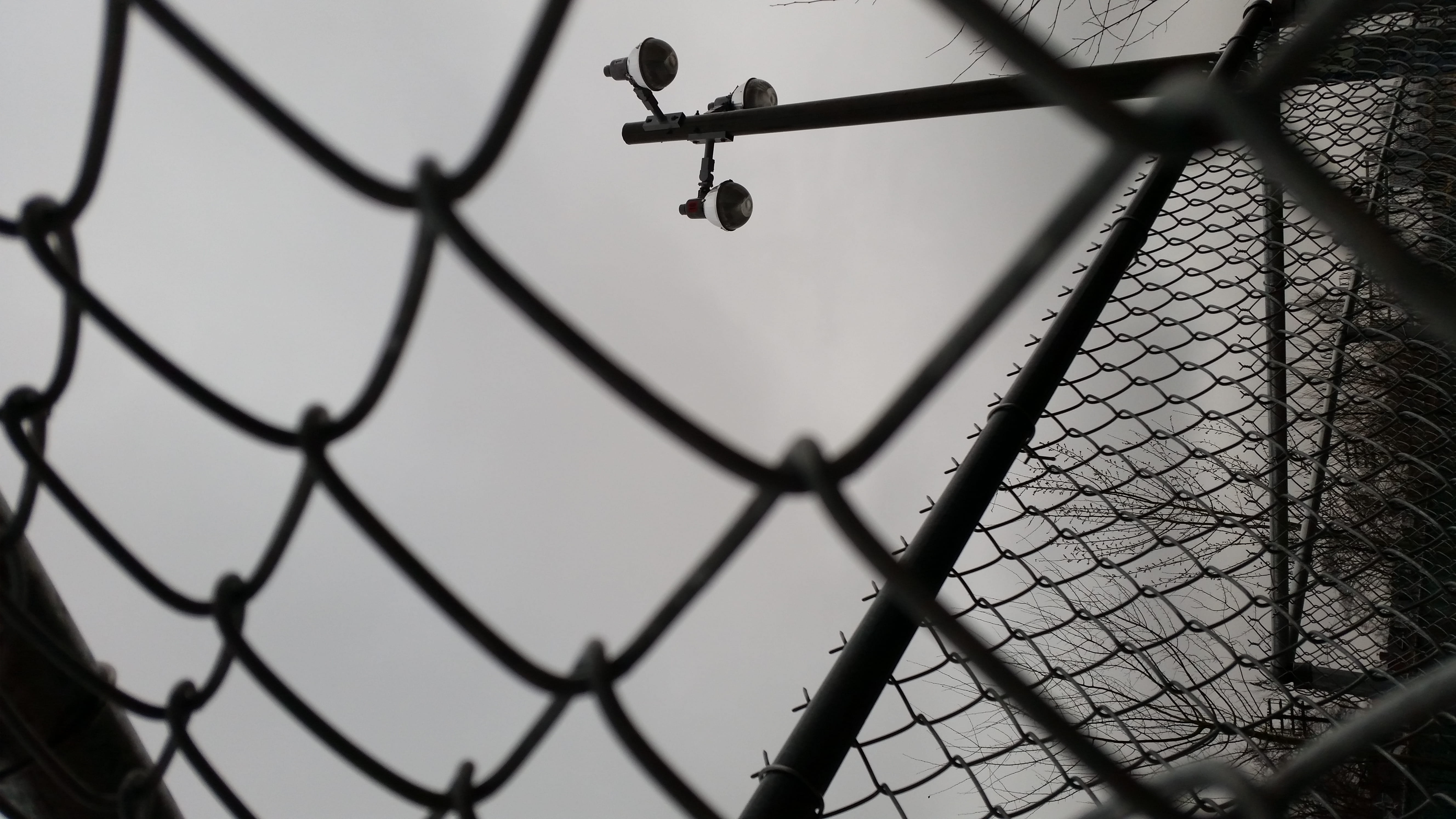 bleak sky, security, grey sky, street light, monochromatic, day, chainlink, nature, close-up, fence, sky, low angle view, 5K, protection, greyscale, cloudy, HD Wallpaper
