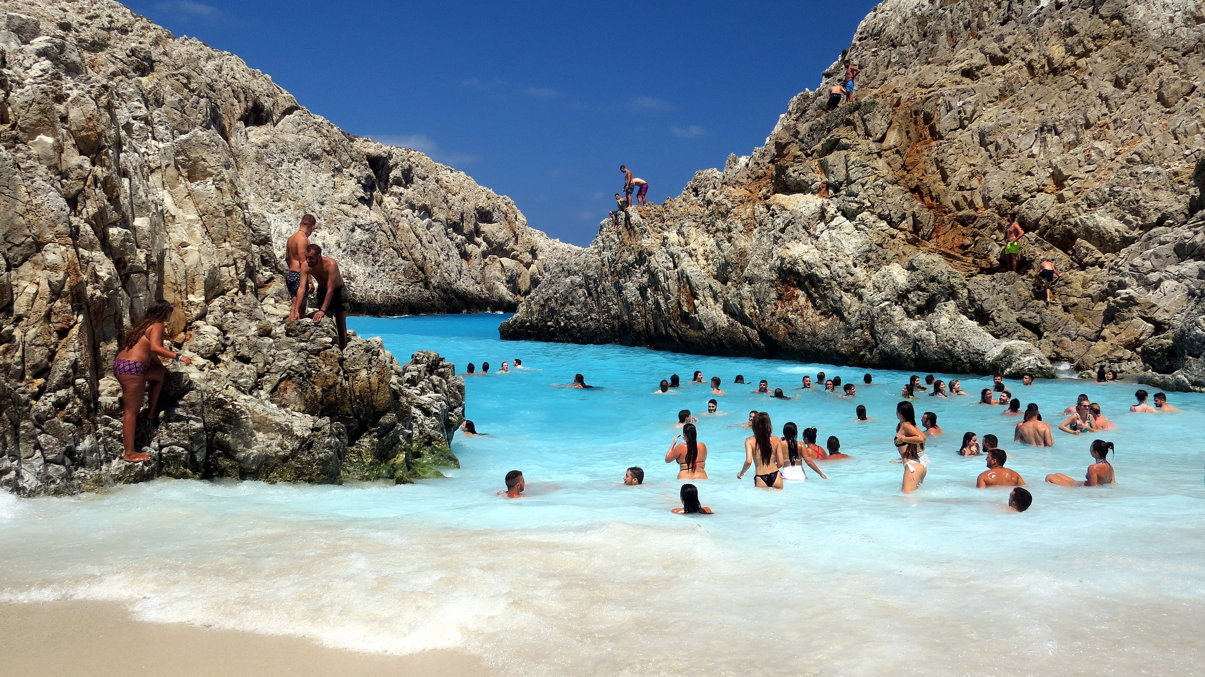 greece, trip, rocks, outdoors, sea, blue, formation, crete, lazur, view, holiday, the waves, crowd, group of people, land, beach, swimming, solid, men, HD Wallpaper