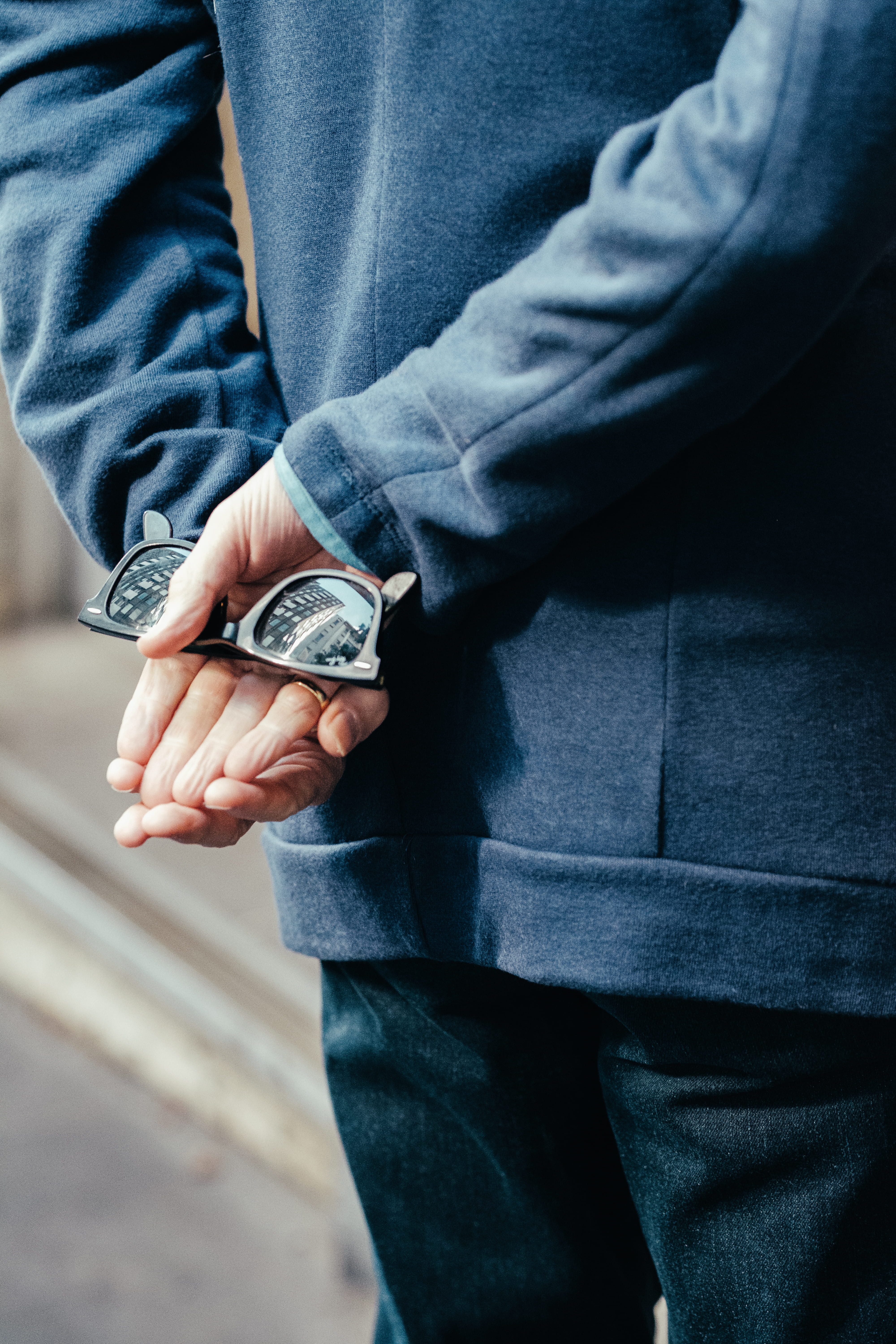 currency, jeans, adult, 90mmfujinon, detail, fujifilm, man, sweatshirt, outdoors, behind back, one person, city, reflection, framed, ban, men, casual clothing, Phone HD Wallpaper