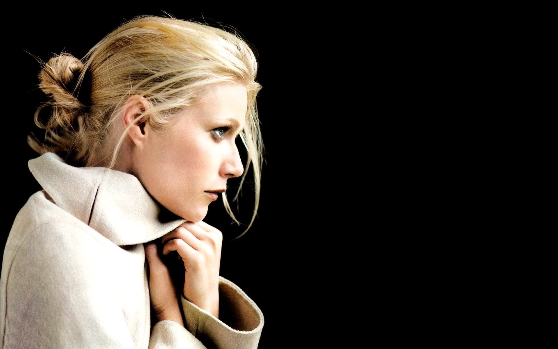 blond hair, listening, studio shot, beauty, looking away, contemplation, portrait, hairstyle, beautiful woman, gwyneth paltrow women blonde actress hair bun simple background black black background blue eyes face side view, HD Wallpaper