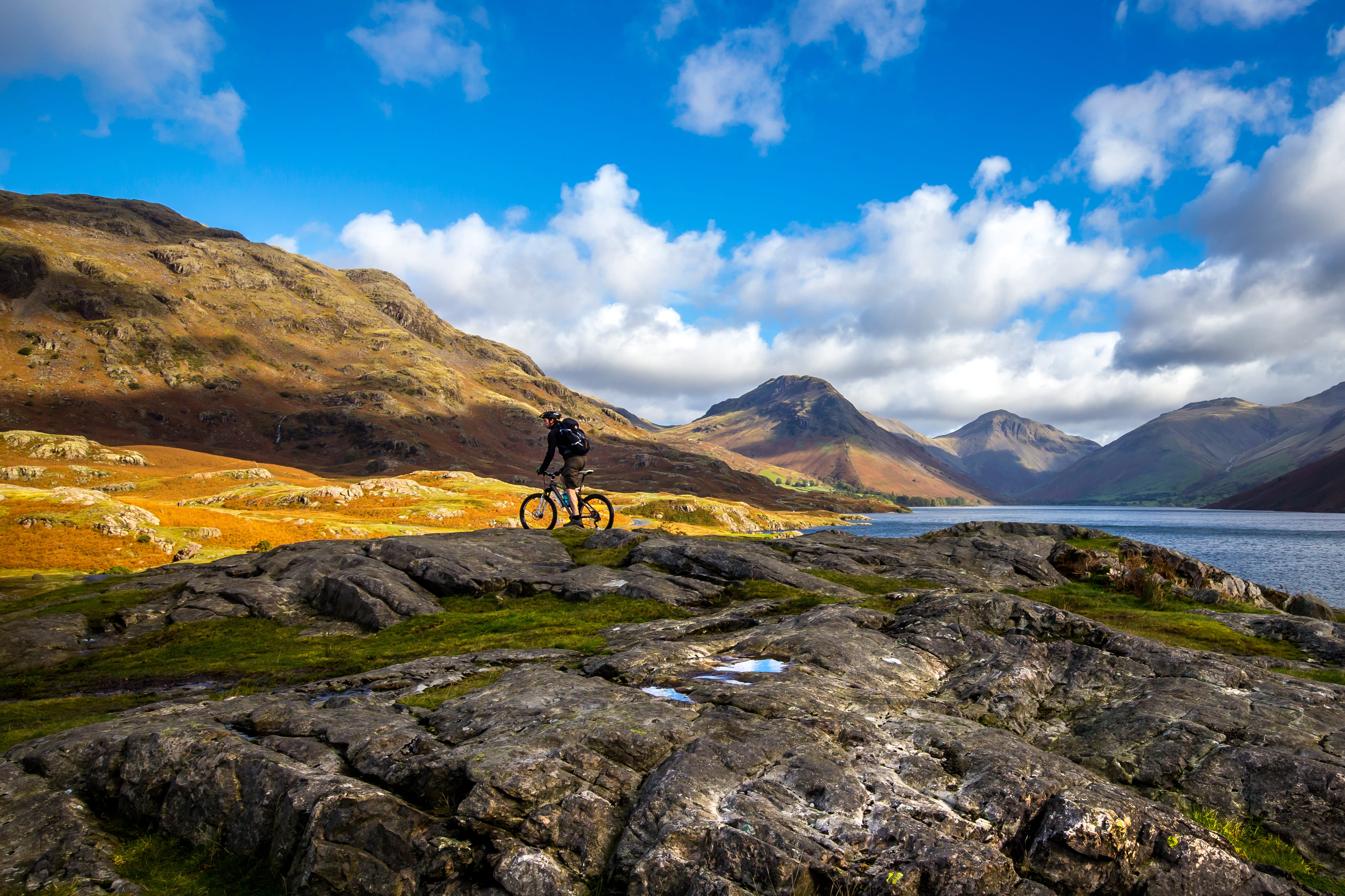 one person, mountain, rock, cloud - sky, 4K, water, environment, biking, rock - object, scenics - nature, person, looking at view, autumn, nature, beauty in nature, HD Wallpaper