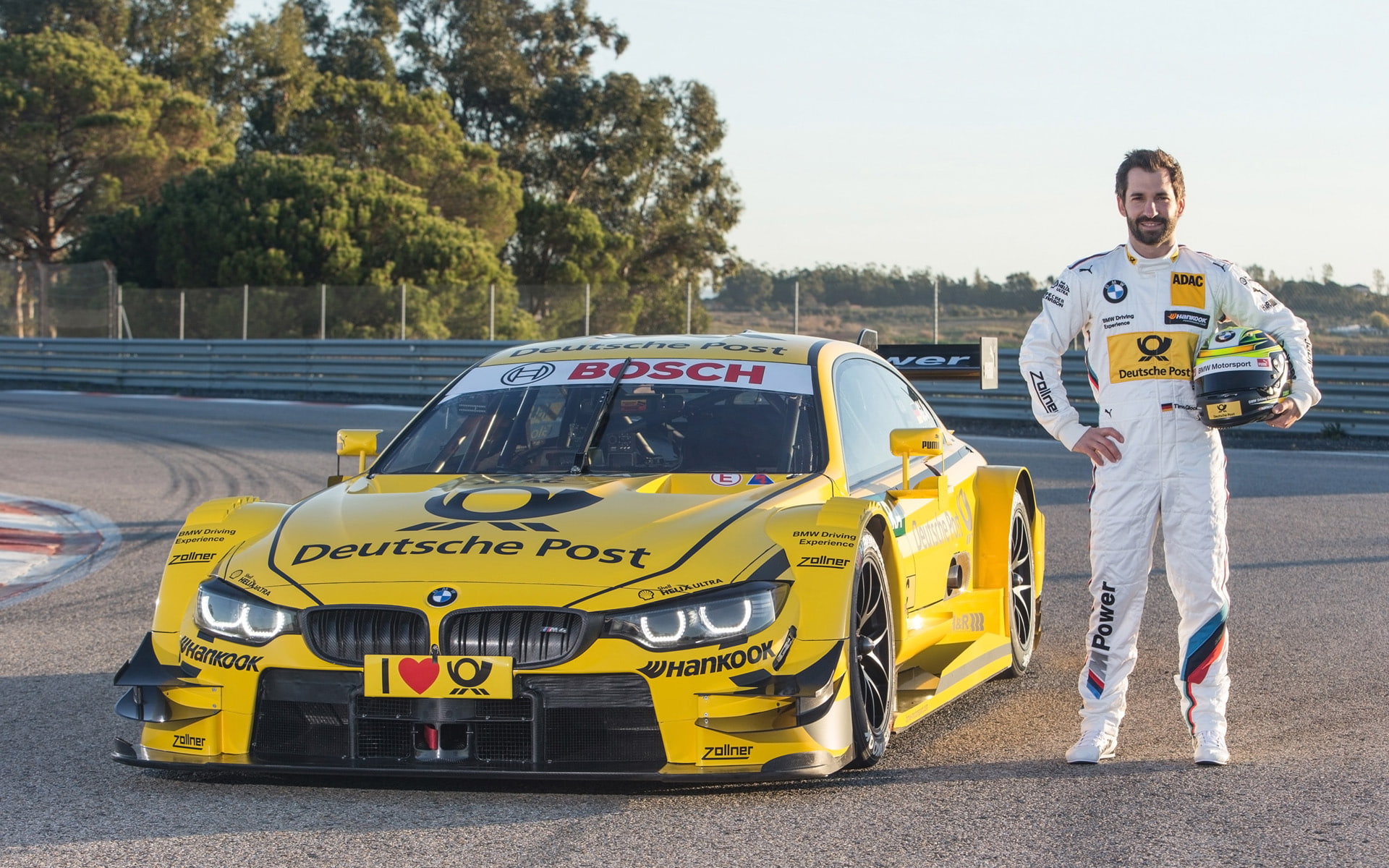 full length, mode of transportation, bmw, helmet, portrait, men, racing, yellow, front view, transportation, m, looking at camera, standing, one person, HD Wallpaper