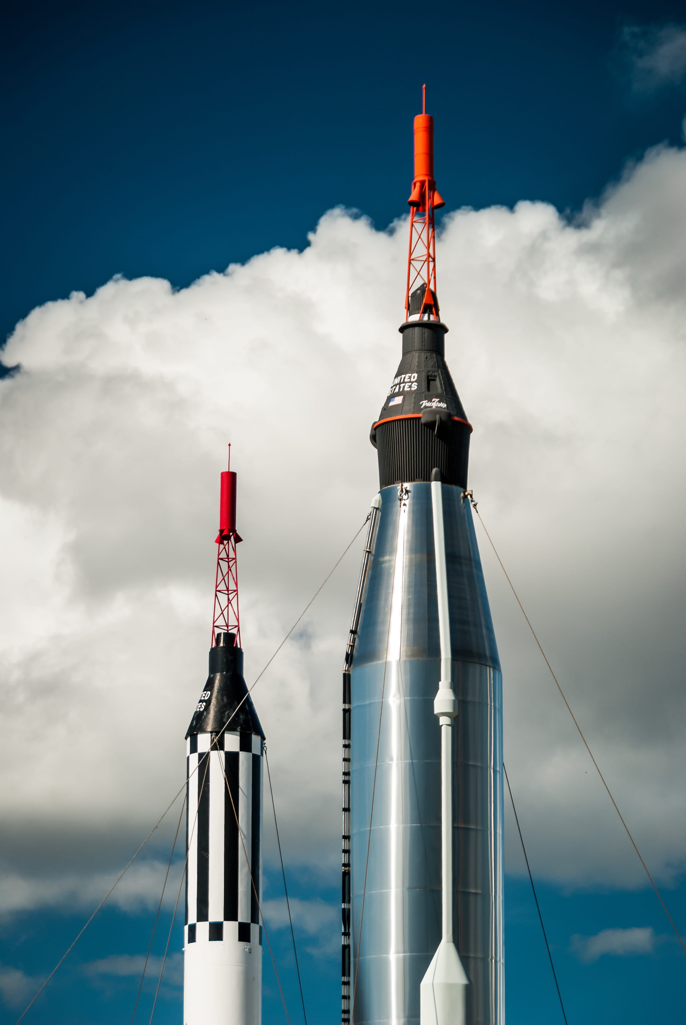 tower, road, building exterior, no people, low angle view, flag, travel, kennedy space center, united states, launch, city, mode of transportation, vehicle, Phone HD Wallpaper