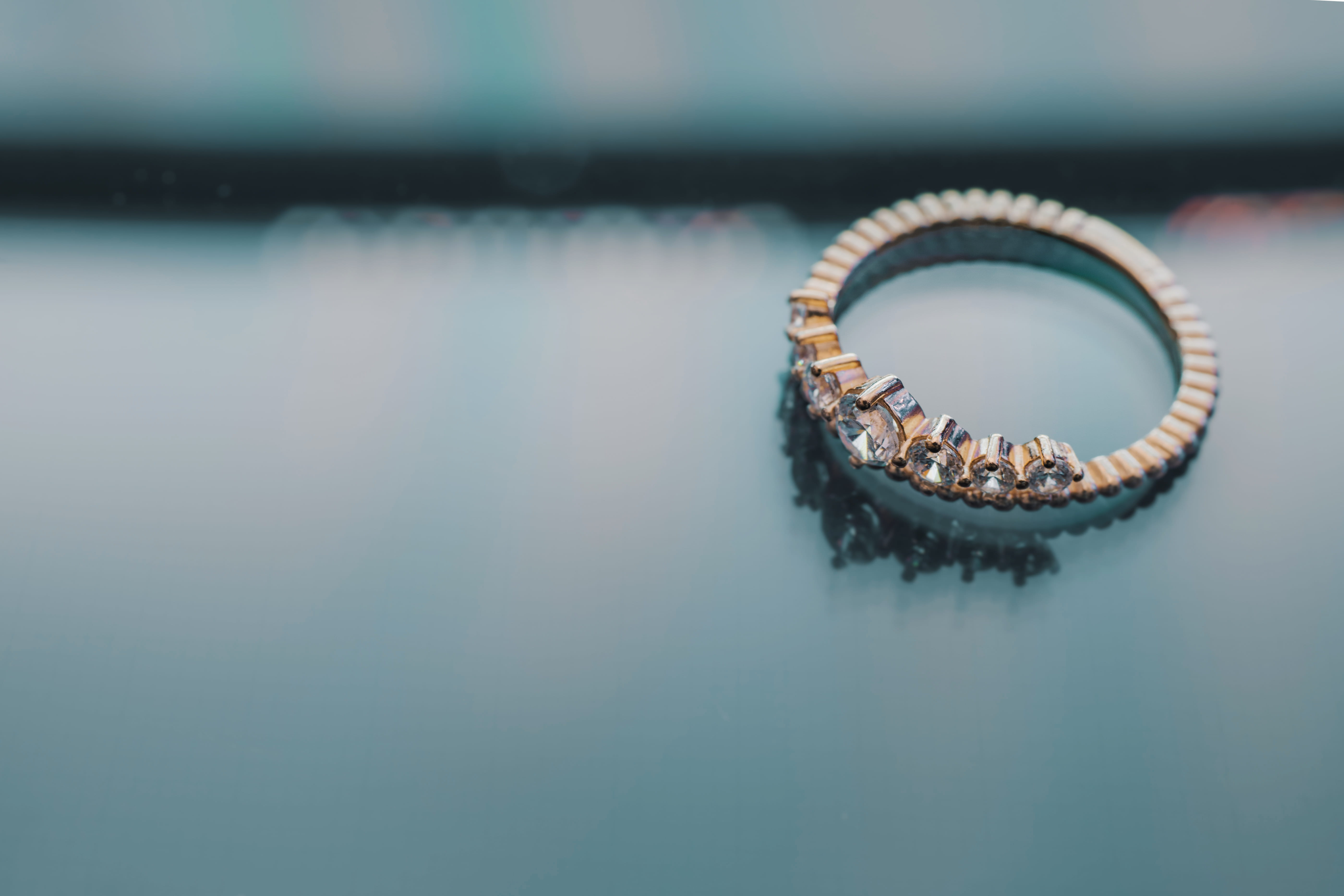 ring, jewelry, indoors, gold, shape, selective focus, table, geometric shape, engagement ring, colored, day, bracelet, circle, personal accessory, engagement, HD Wallpaper