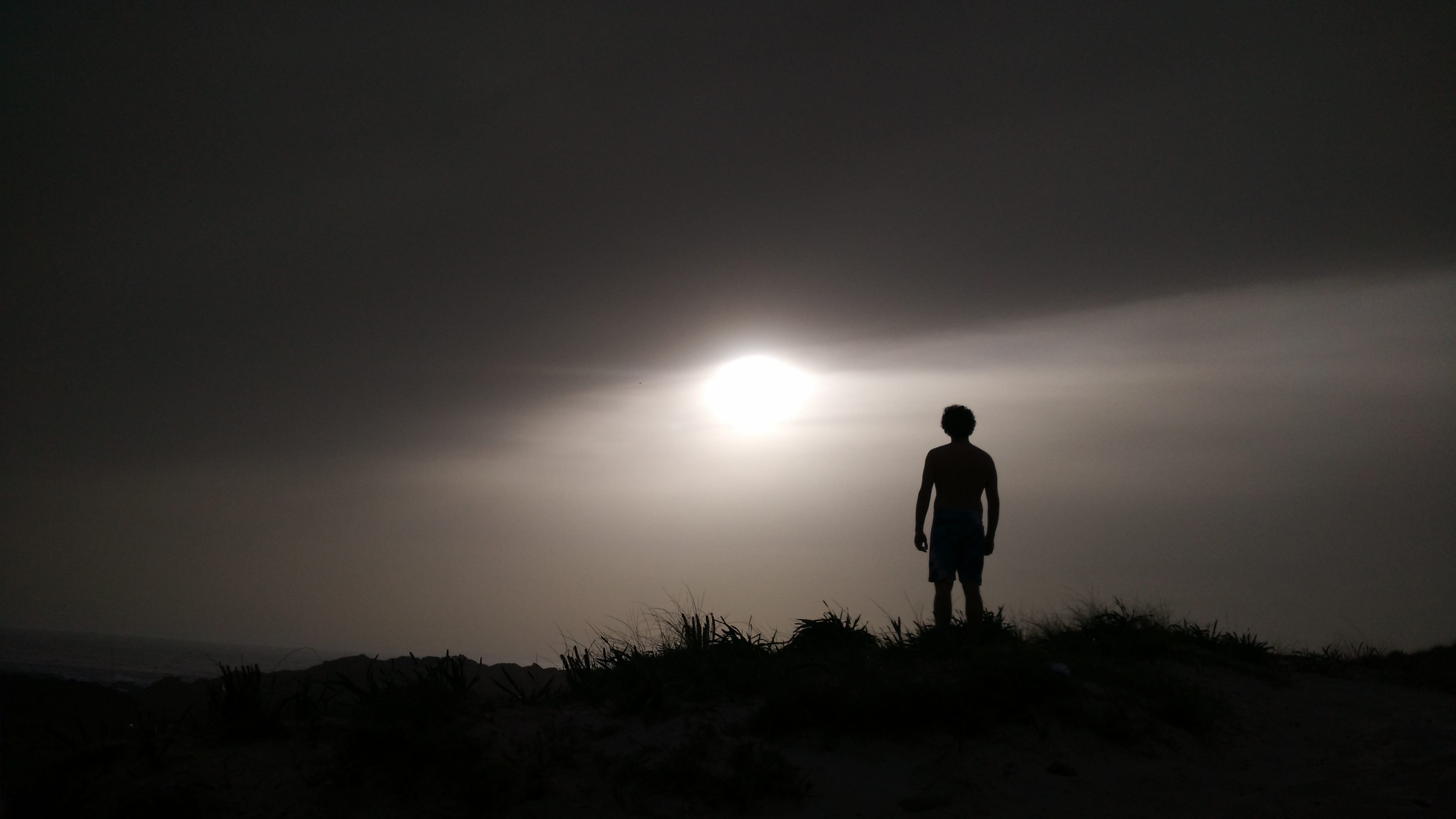 tranquility, beauty in nature, grey, cloudscape, man, clouds, shadow, rear view, copy space, sun, land, 4K, outdoors, solitude, dark, scenics - nature, HD Wallpaper