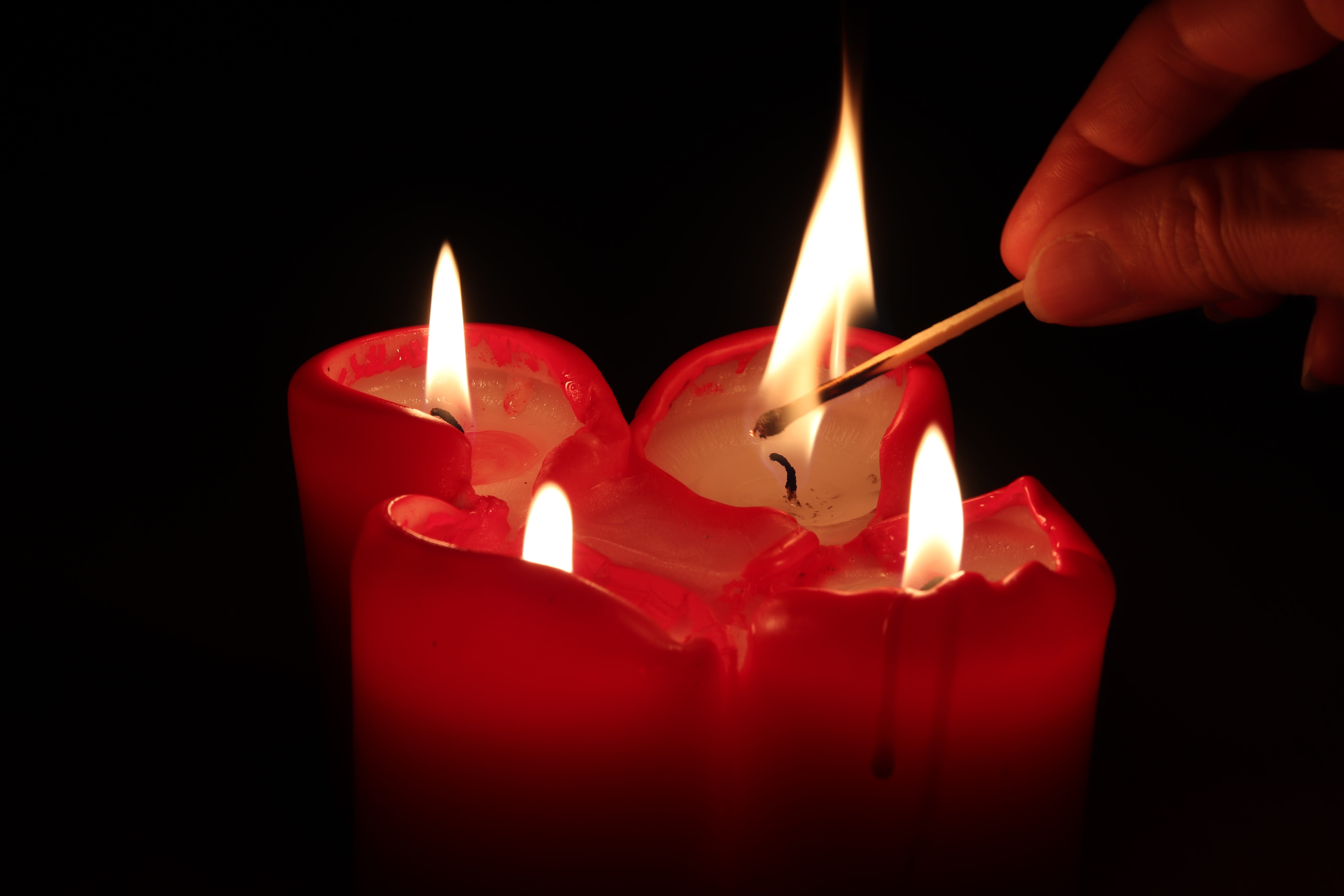 candlelight, holding, candle, close-up, shining, burn, heat - temperature, red, fire - natural phenomenon, black background, roma table, matchstick, hand, HD Wallpaper