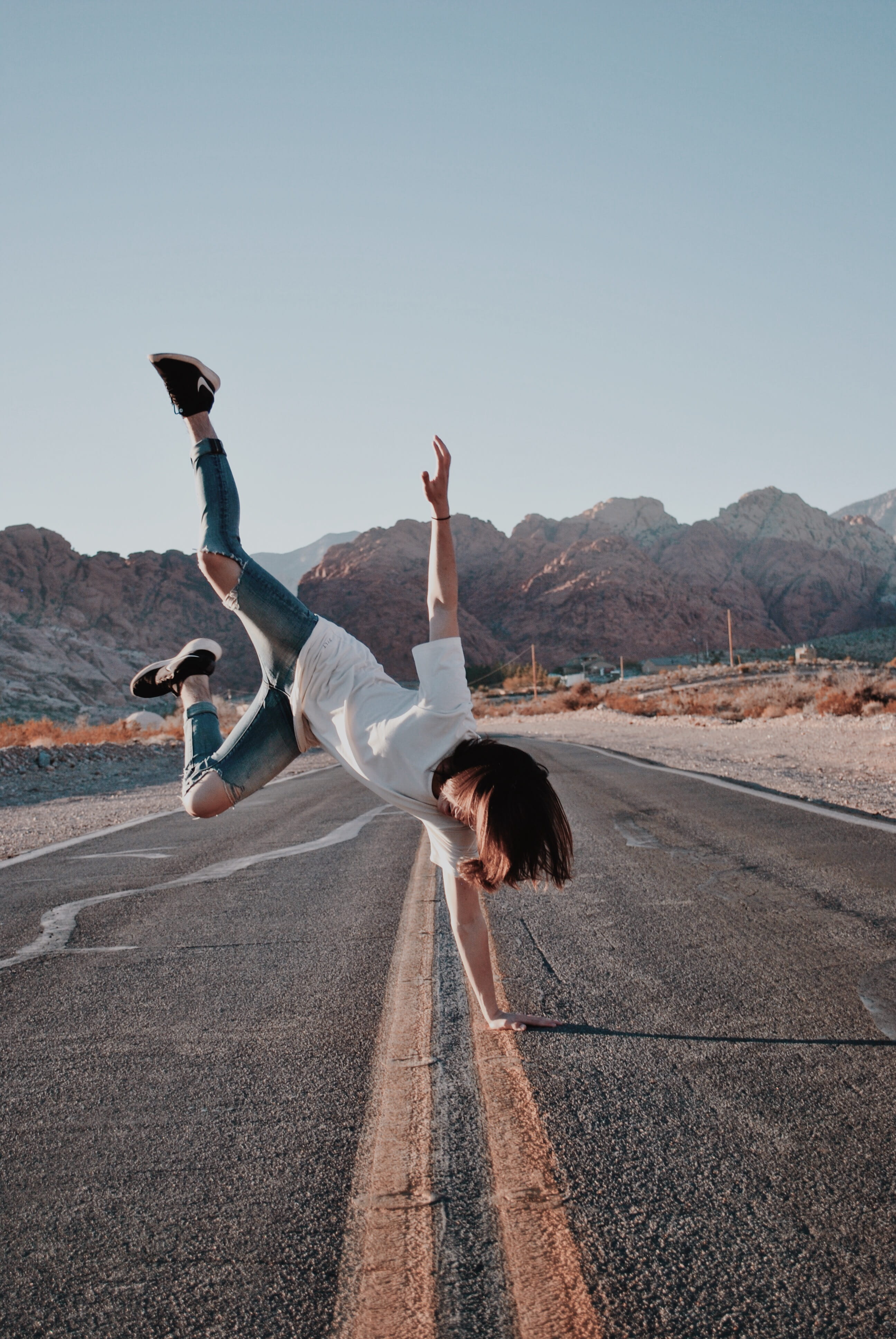 sunlight, lifestyles, sky, road, casual clothing, side view, sport, land, human, finger, hairstyle, kicking, outdoors, real people, tarmac, jeans, highway, Phone HD Wallpaper