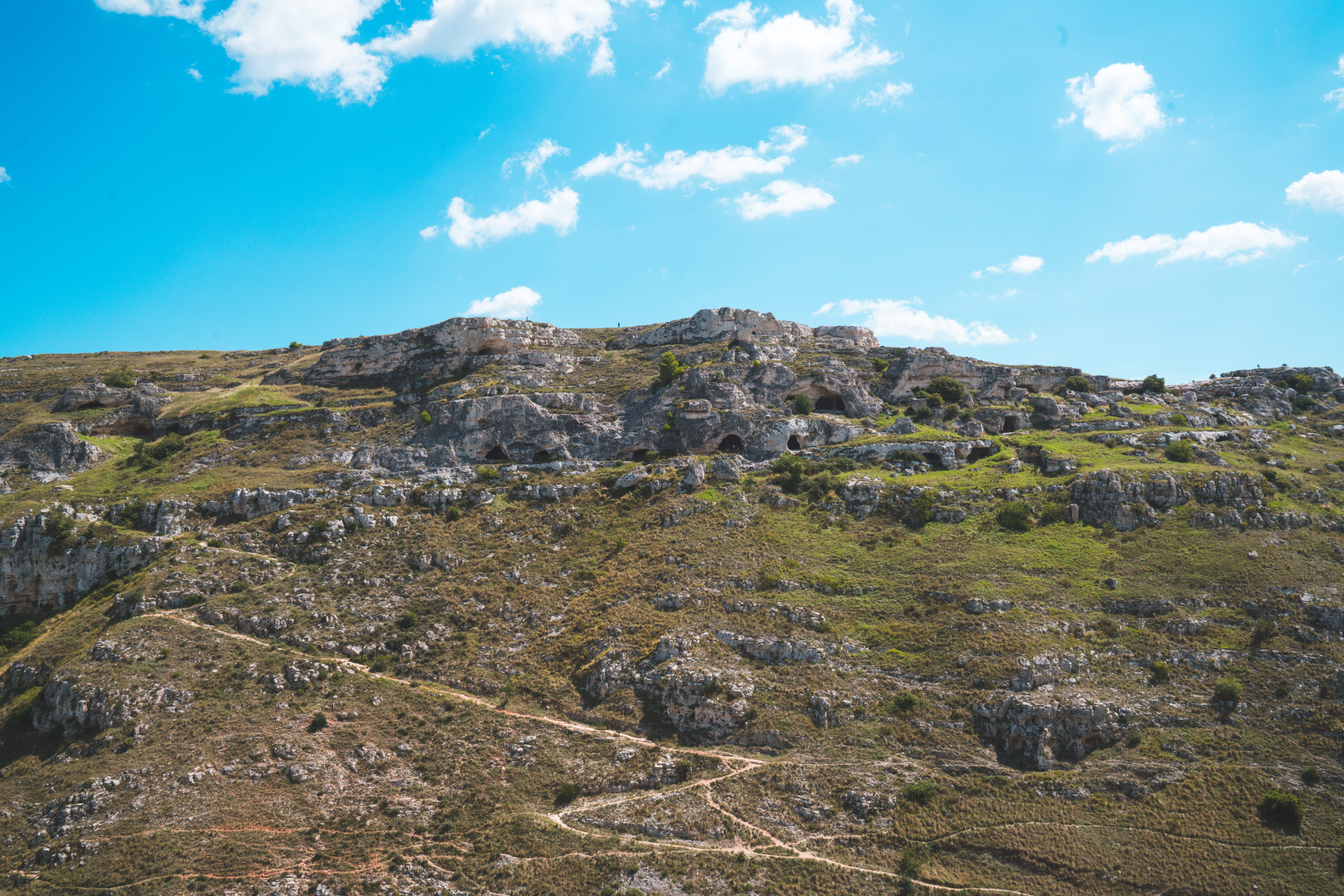 testimonials, tranquility, outdoors, rock - object, sasso caveoso, idyllic, mountain, land, formation, cloud - sky, borgo, day, beauty in nature, sky, tranquil scene, HD Wallpaper