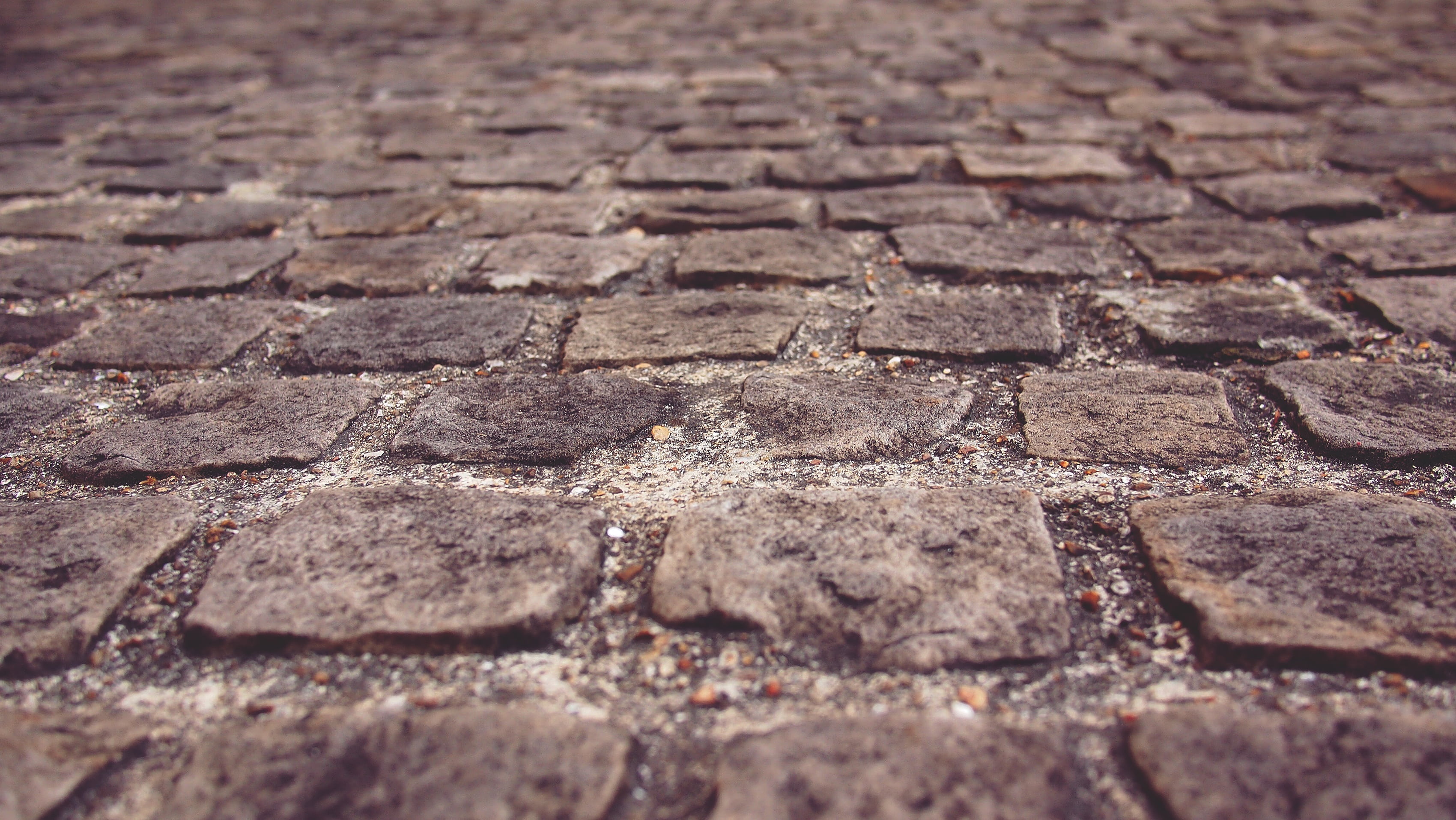 street, pattern, road, surface level, going, selective focus, way, day, 2K, stone material, hope, door, textured effect, outdoor, cobblestone, walk, backgrounds, HD Wallpaper
