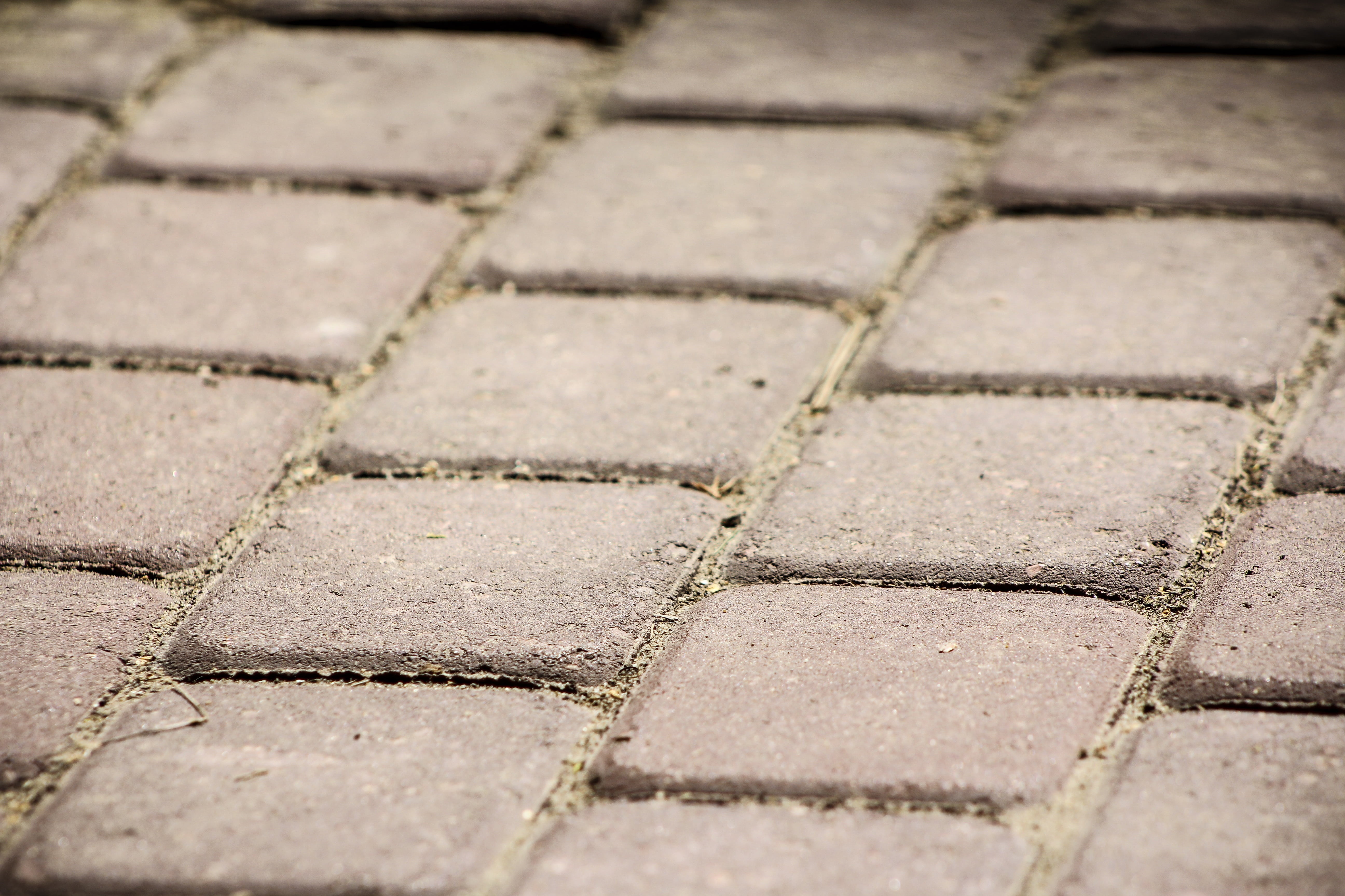selective focus, day, city, stone material, backgrounds, pattern, way, concrete, go, in a row, cobblestone, dice mosaic, walkway, outdoors, geometric shape, HD Wallpaper