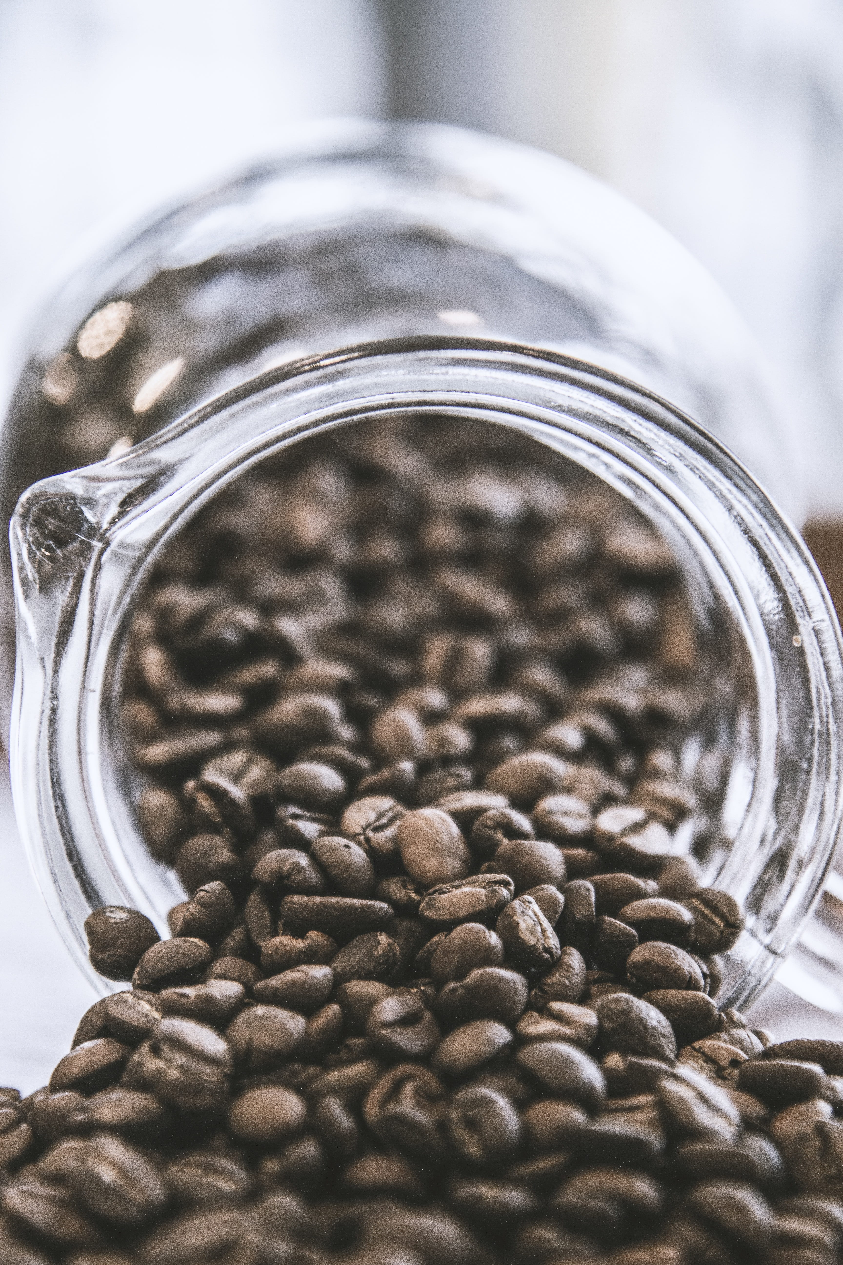 roasted coffee bean, no people, jug, seed, close-up, glass - material, freshness, jar, lockscreen, seeds, spilling, table, selective focus, latte, Phone HD Wallpaper
