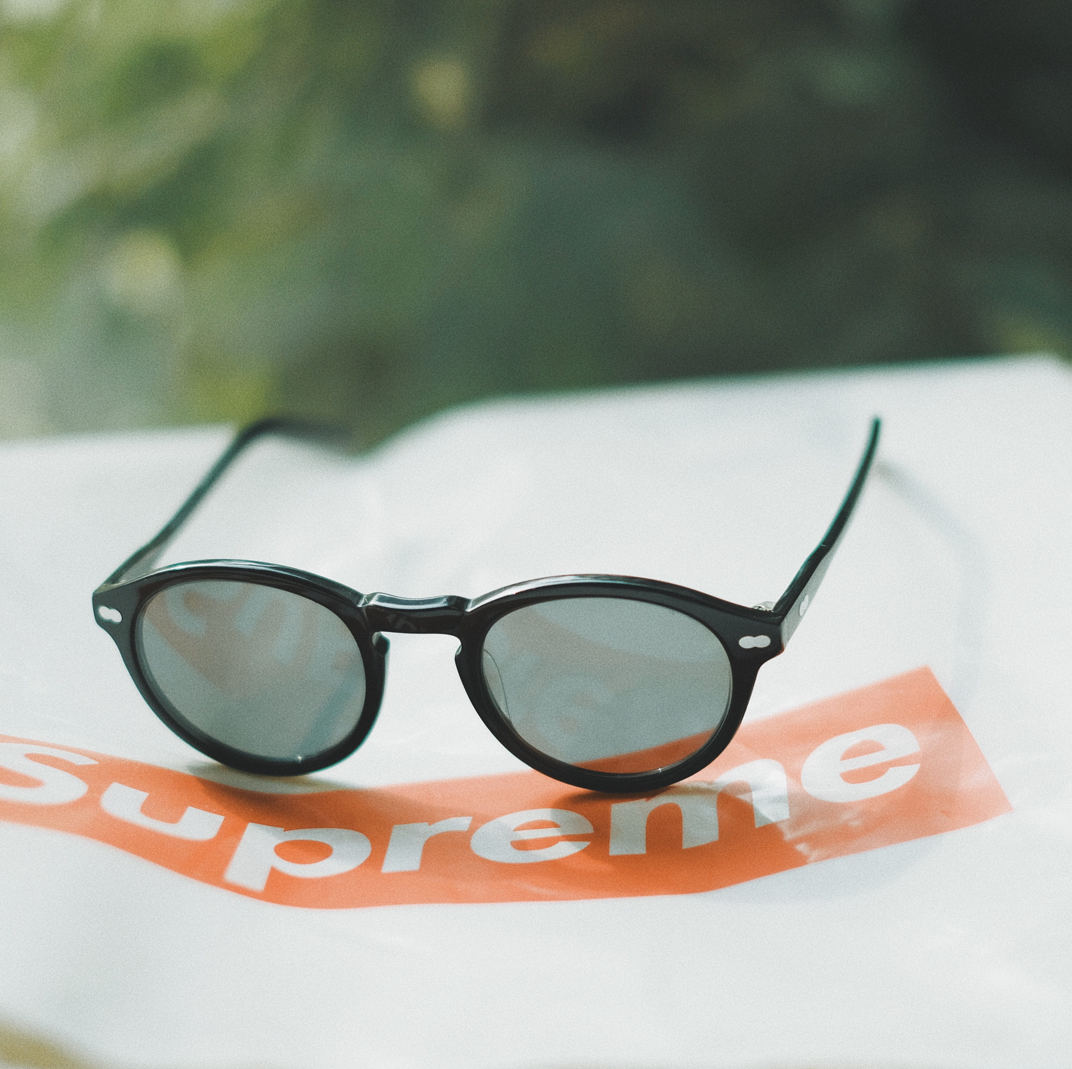 reflection, sunglass, closeup, text, transparent, 2K, object, still life, personal accessory, high angle view, photography, no people, frame, glasses, HD Wallpaper