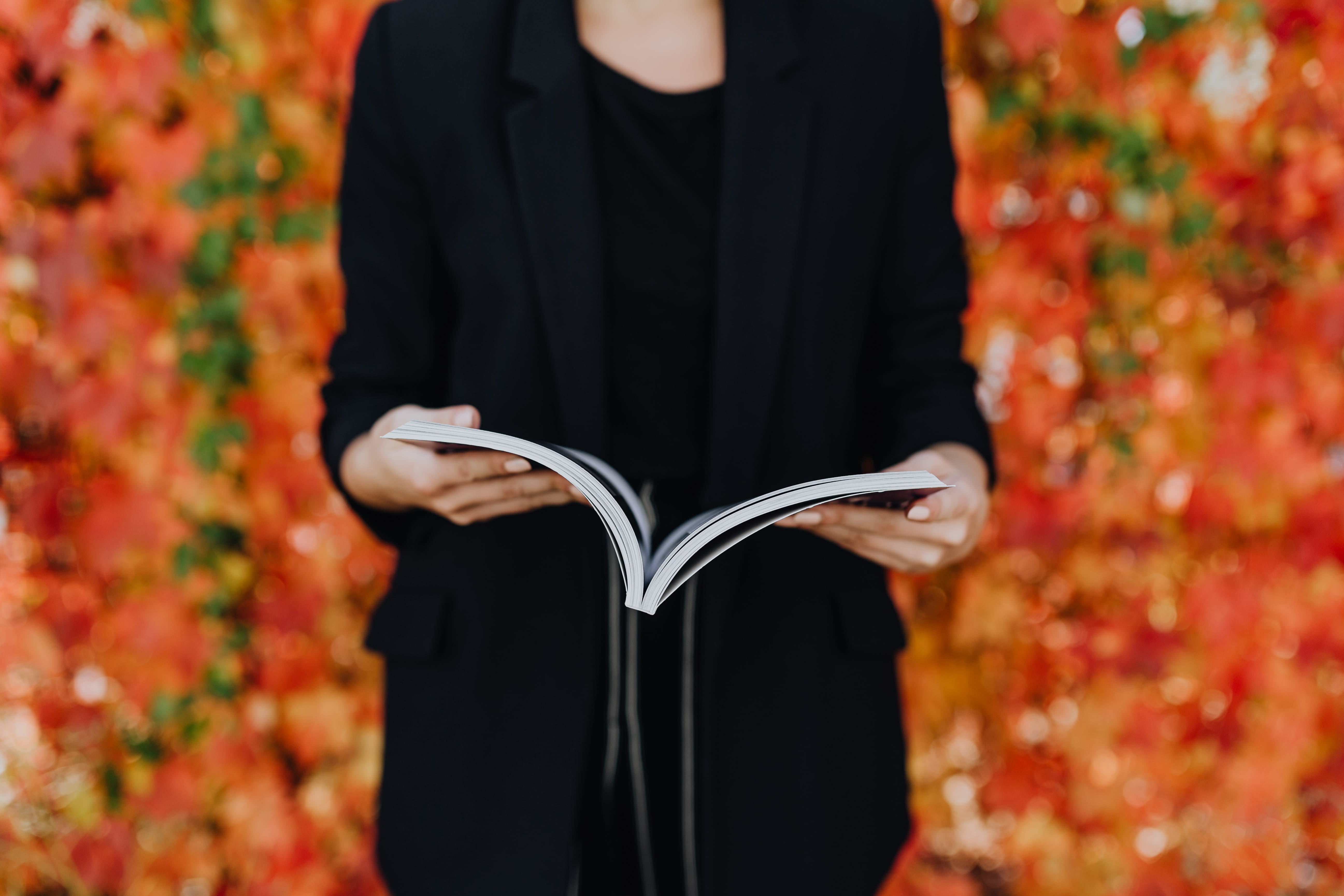 reading, autumn, reader, holding, knowledge, colourful, black color, book, leaves, women, 5K, close-up, standing, formalwear, stock photos, one person, HD Wallpaper