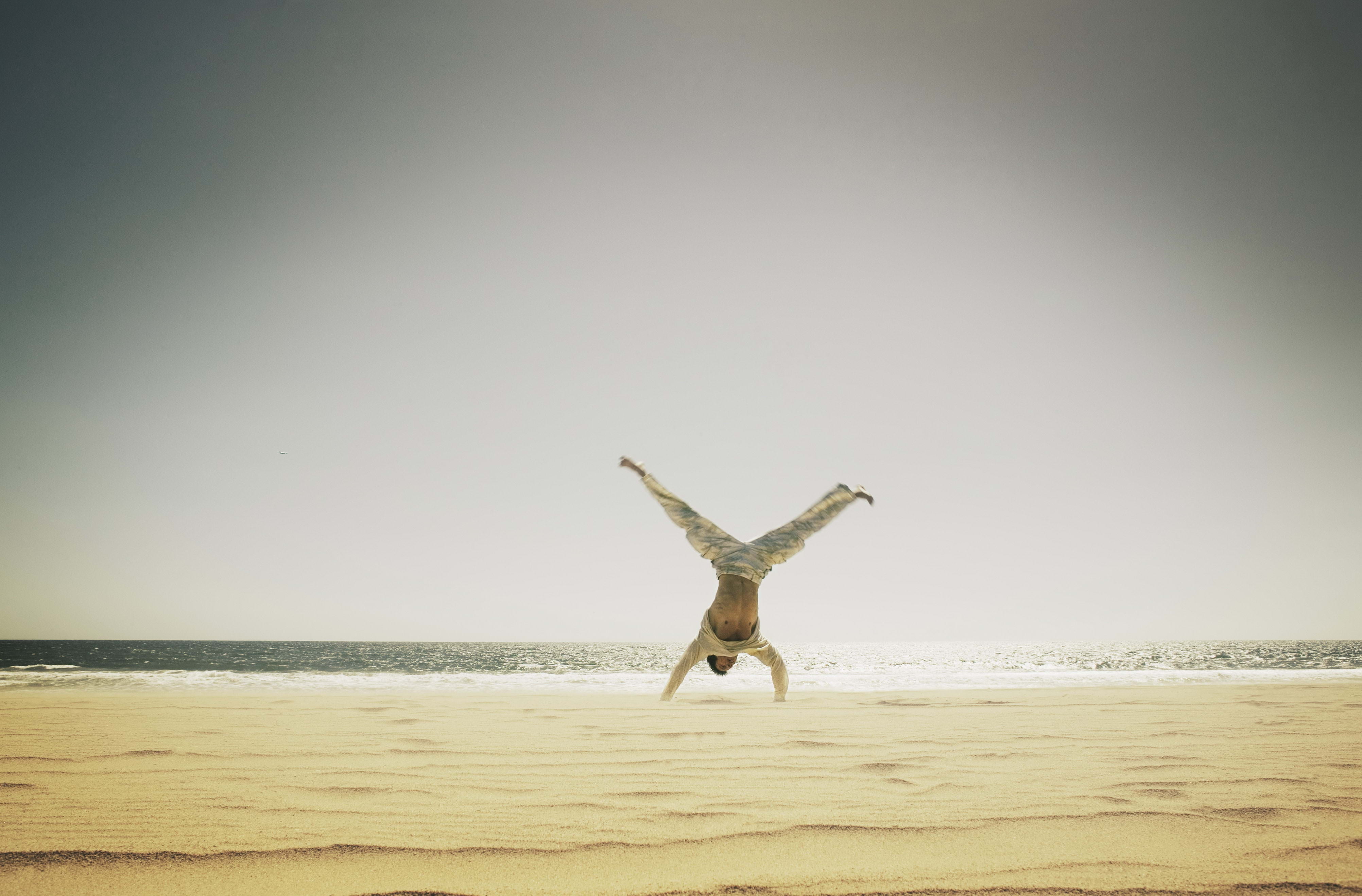 action, one animal, recreational Pursuit, coastline, land, jumping, sea, wave, relaxation, real people, blue, beauty In Nature, one Person, sand, color Image, HD Wallpaper