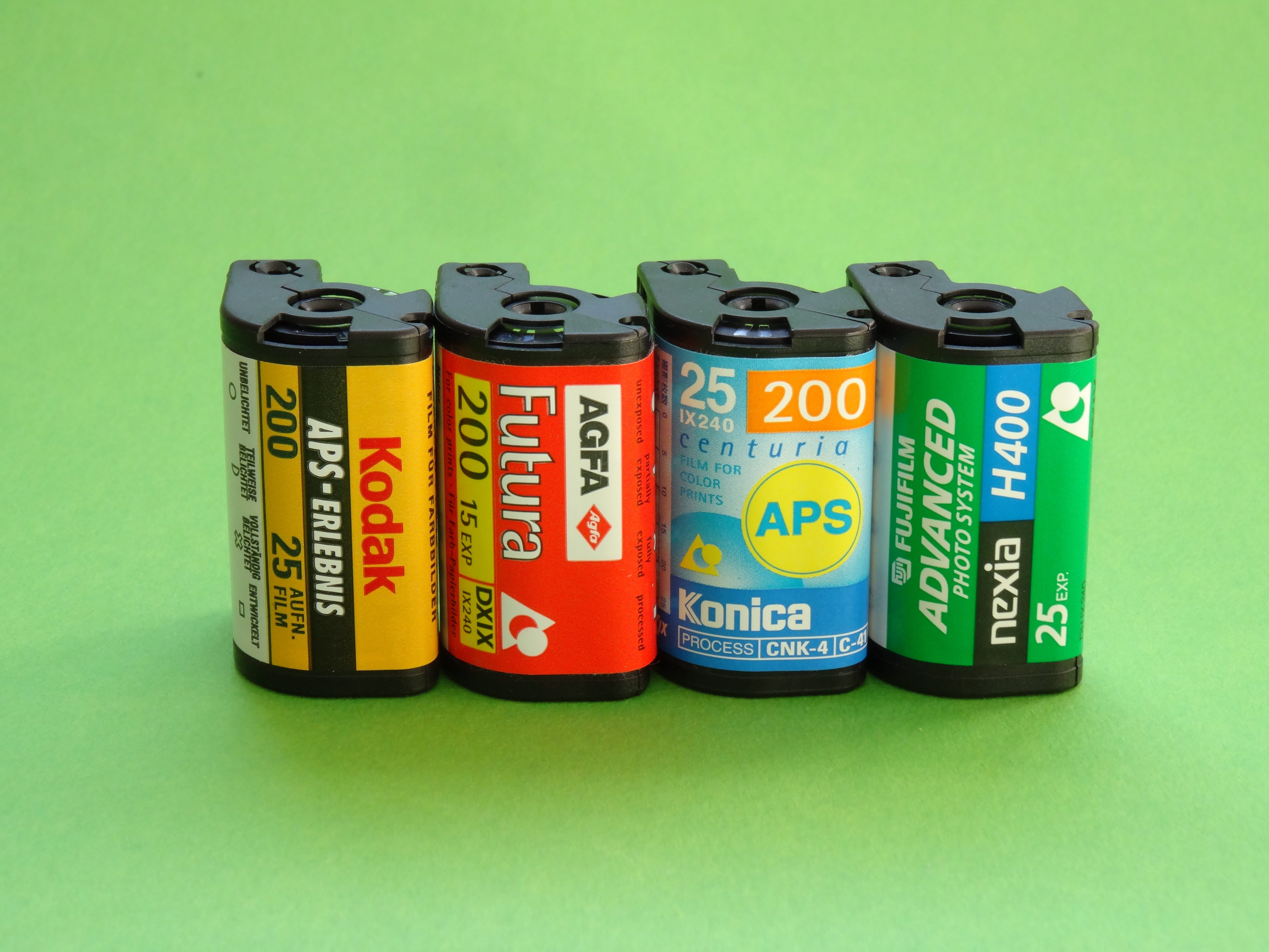 still life, aps, plastic, aps film, multi colored, photo film, group of objects, analog, choice, variation, in a row, film cassette, arrangement, container, HD Wallpaper
