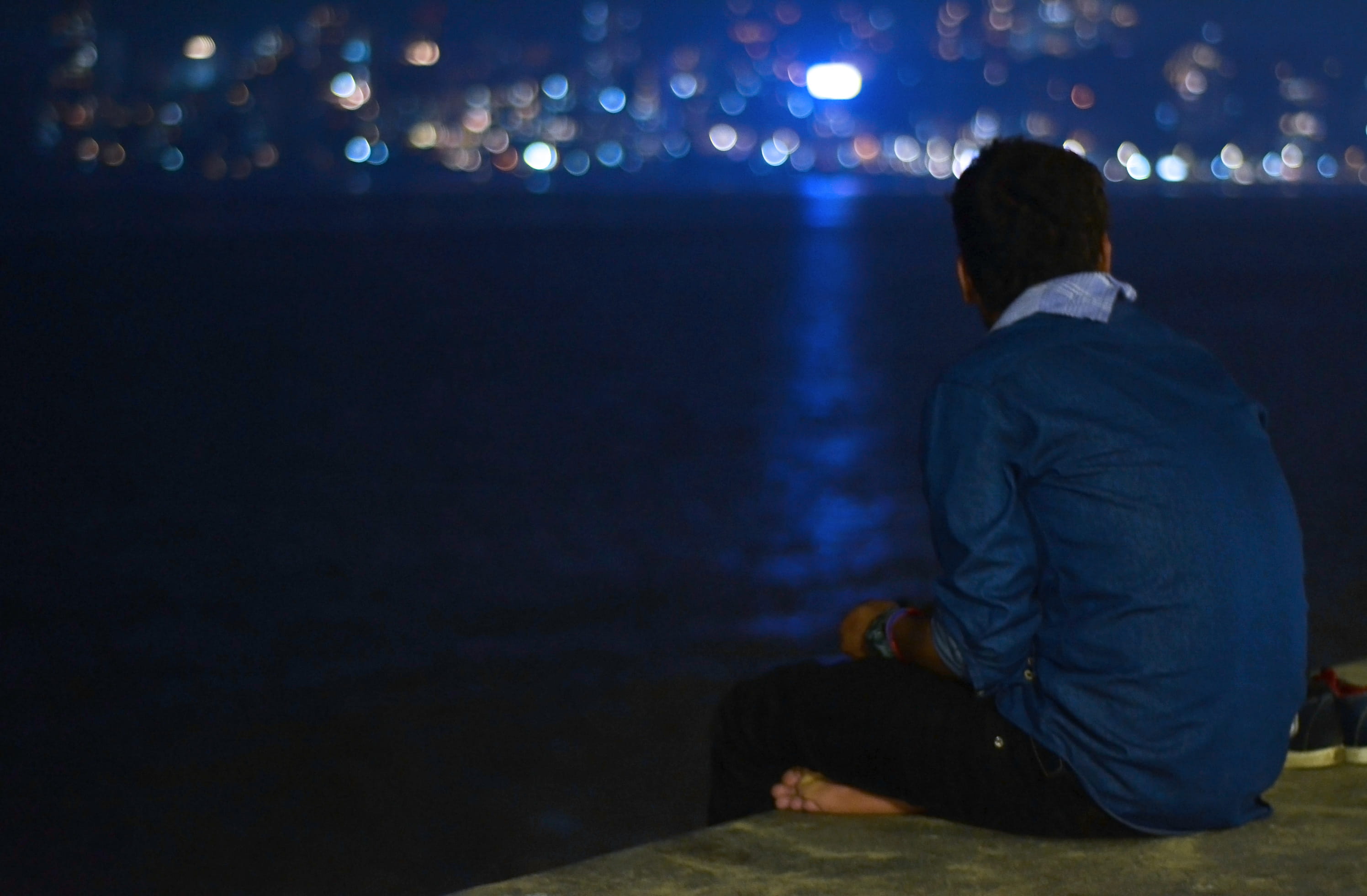 contemplation, looking, vision, sitting, emotion, hood - clothing, crouching, three quarter length, people, stage, casual clothing, adult, night, clothing, HD Wallpaper