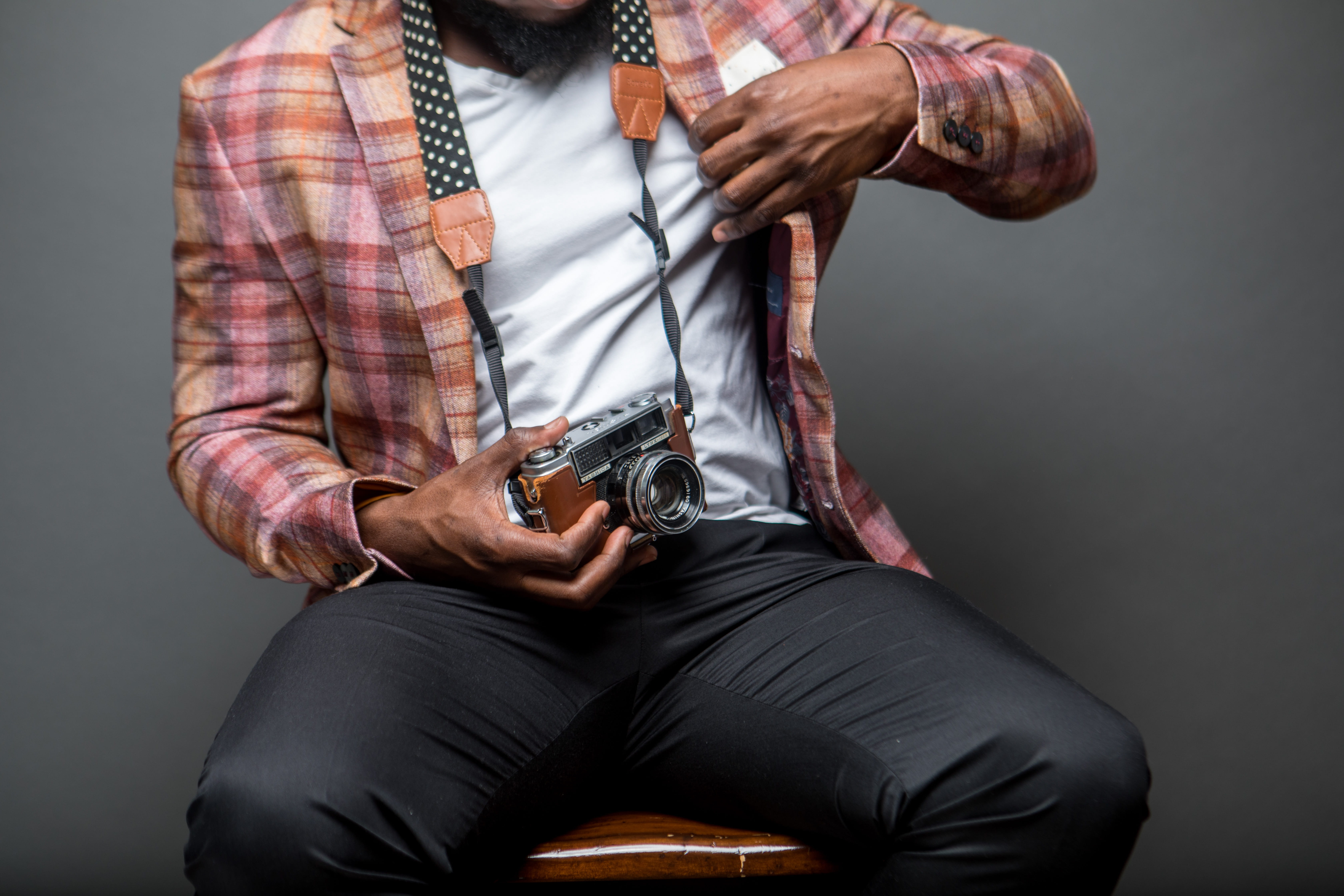 holding, sitting, model, black, casual clothing, men, shirt, young adult, studio shot, person, button, human body part, gray, plaid, aggression, wear, portrait, HD Wallpaper