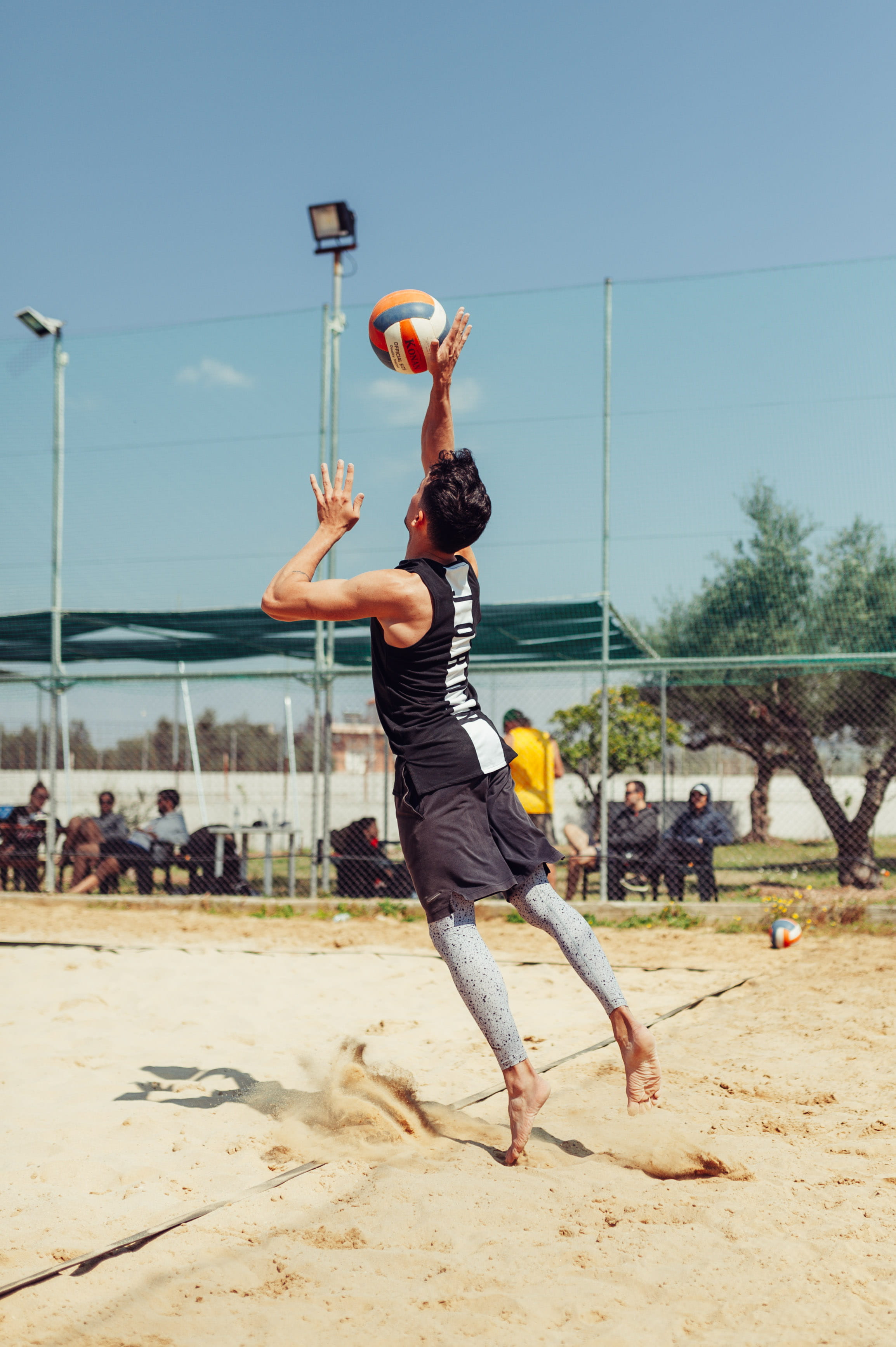 real people, black, full length, land, human arm, skill, motion, incidental people, sport, ball, jumping, leisure activity, 2K, arms raised, nature, outdoors, Phone HD Wallpaper